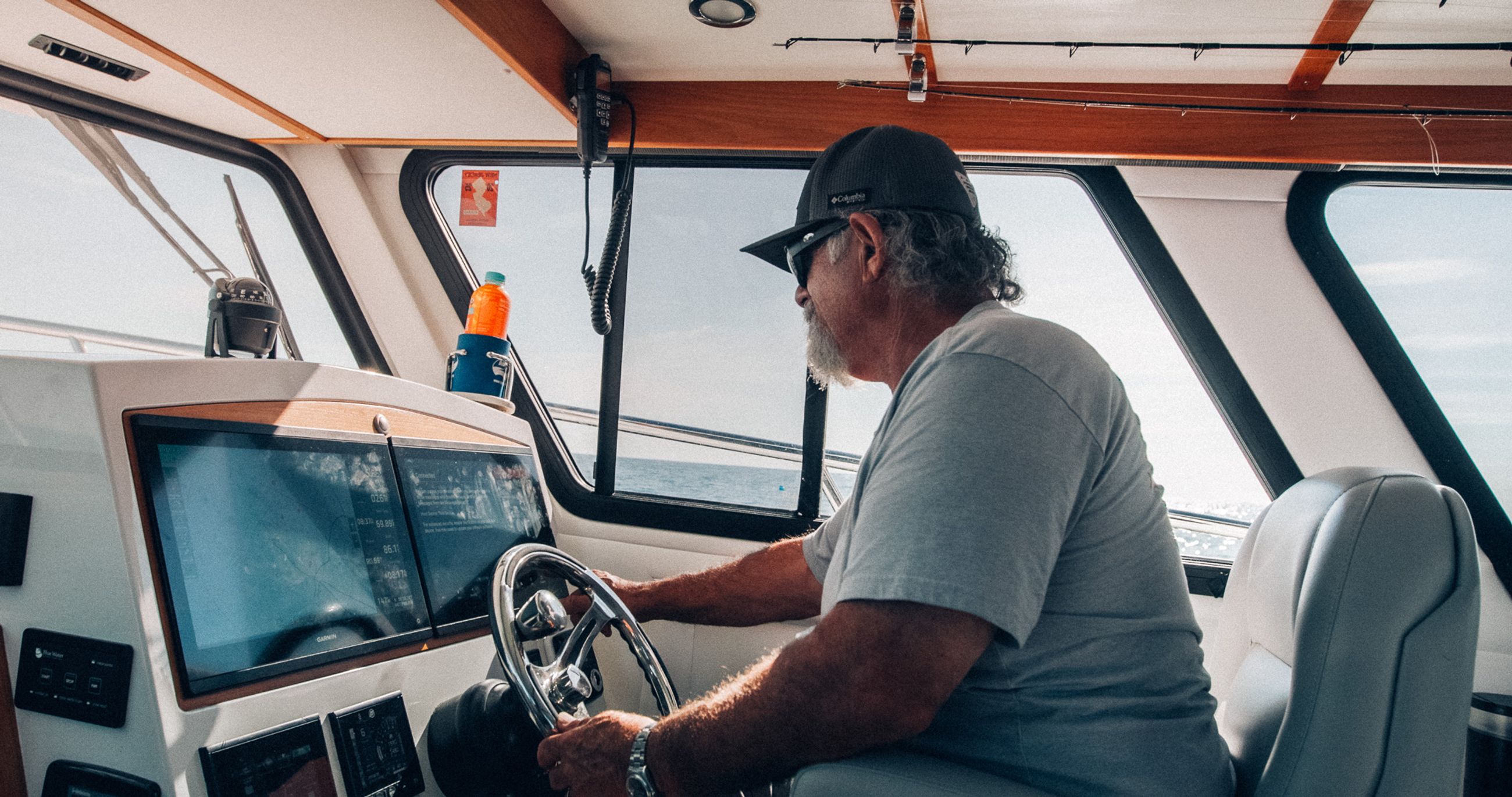 Captain at helm aboard the Lindell 41