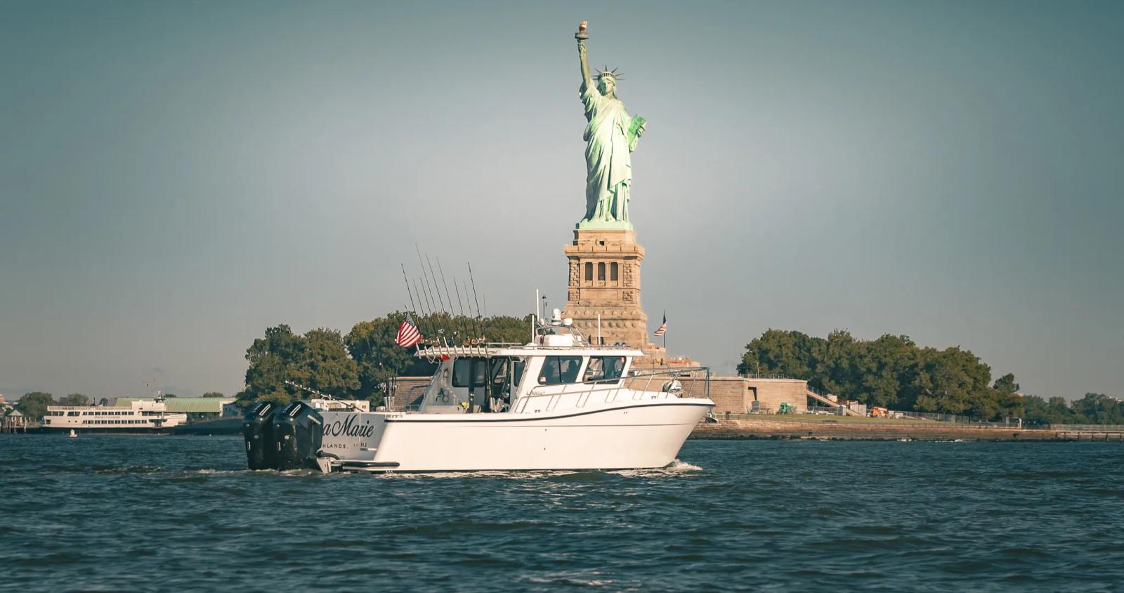 A lindell 38 infront of the statue of liberty