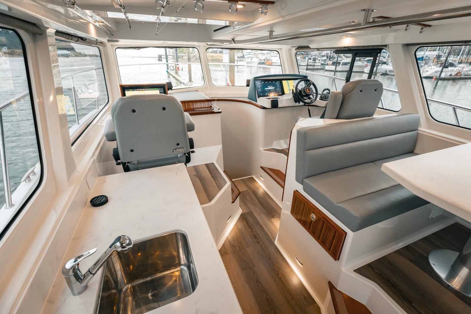 The pilothouse salon and galley of the Lindell 48