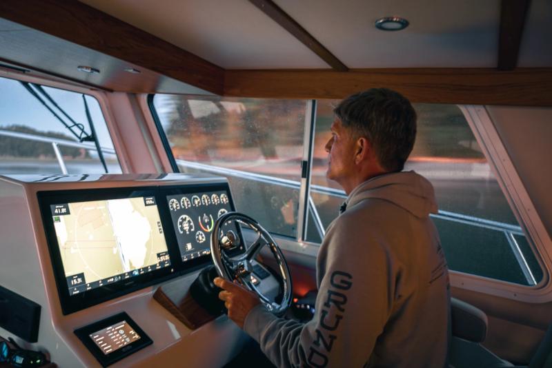 Photo of our President Mark Fritzer using the glass cockpit in a Lindell