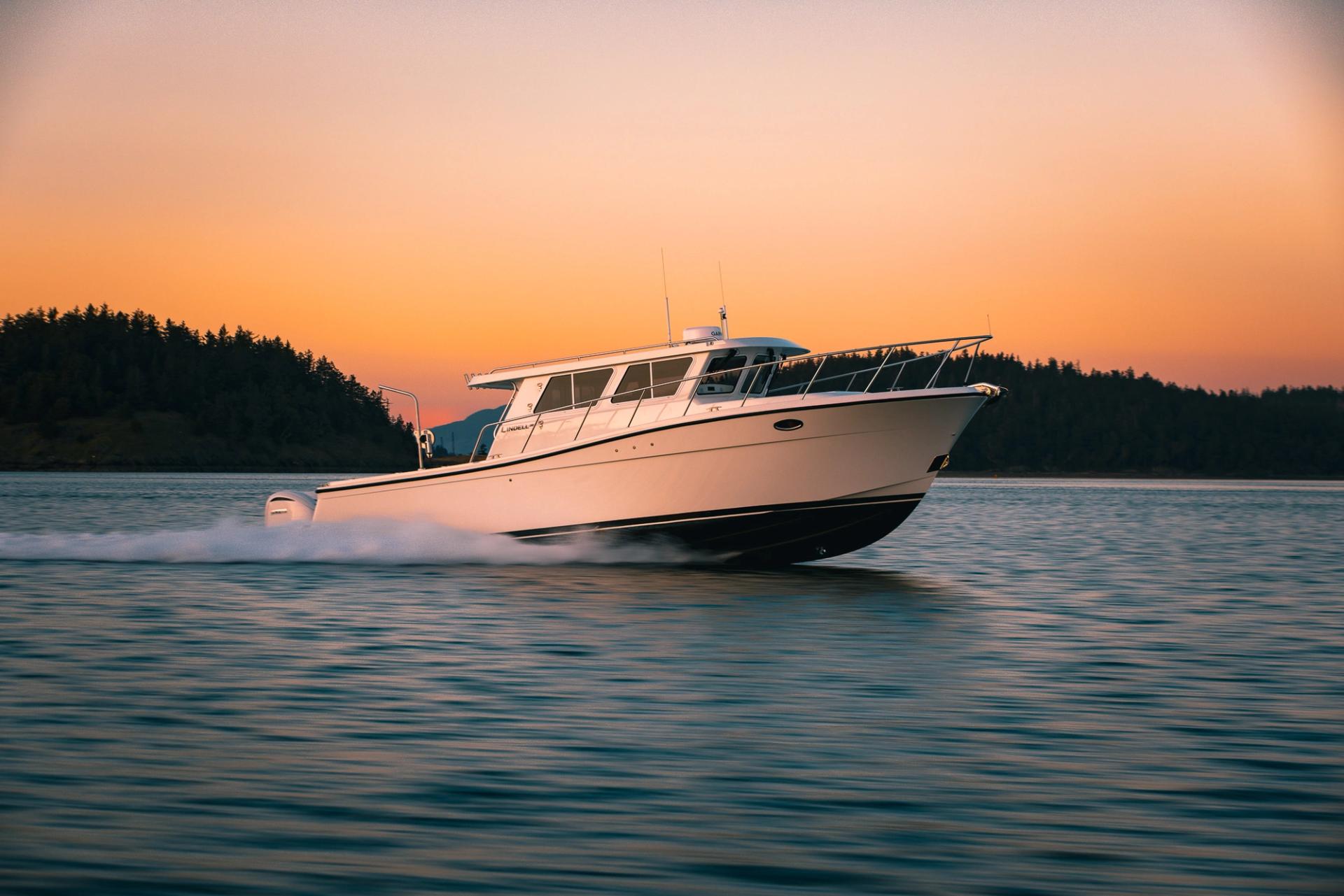 Lindell Yachts 38 at full speed at sundown near La Conner Washington