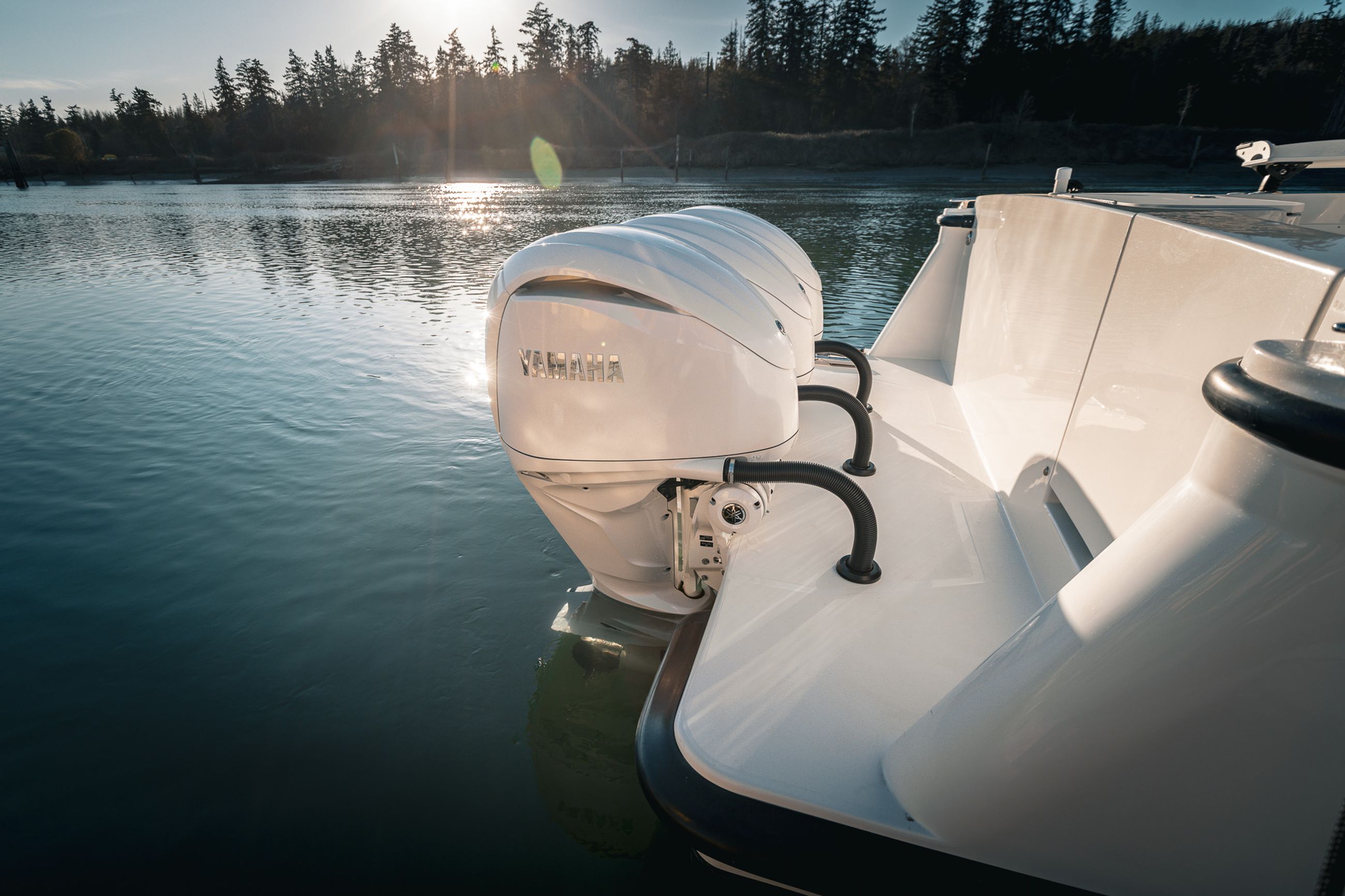 Triple Yamaha 350hp outboards on the back of the Lindell 38'
