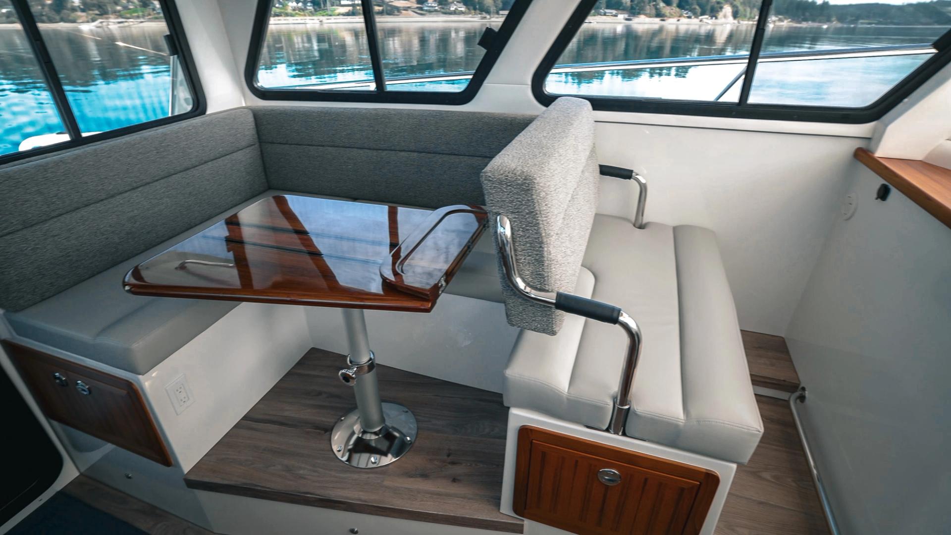 Lindell 41 copilot seat and salon on port side in pilothouse