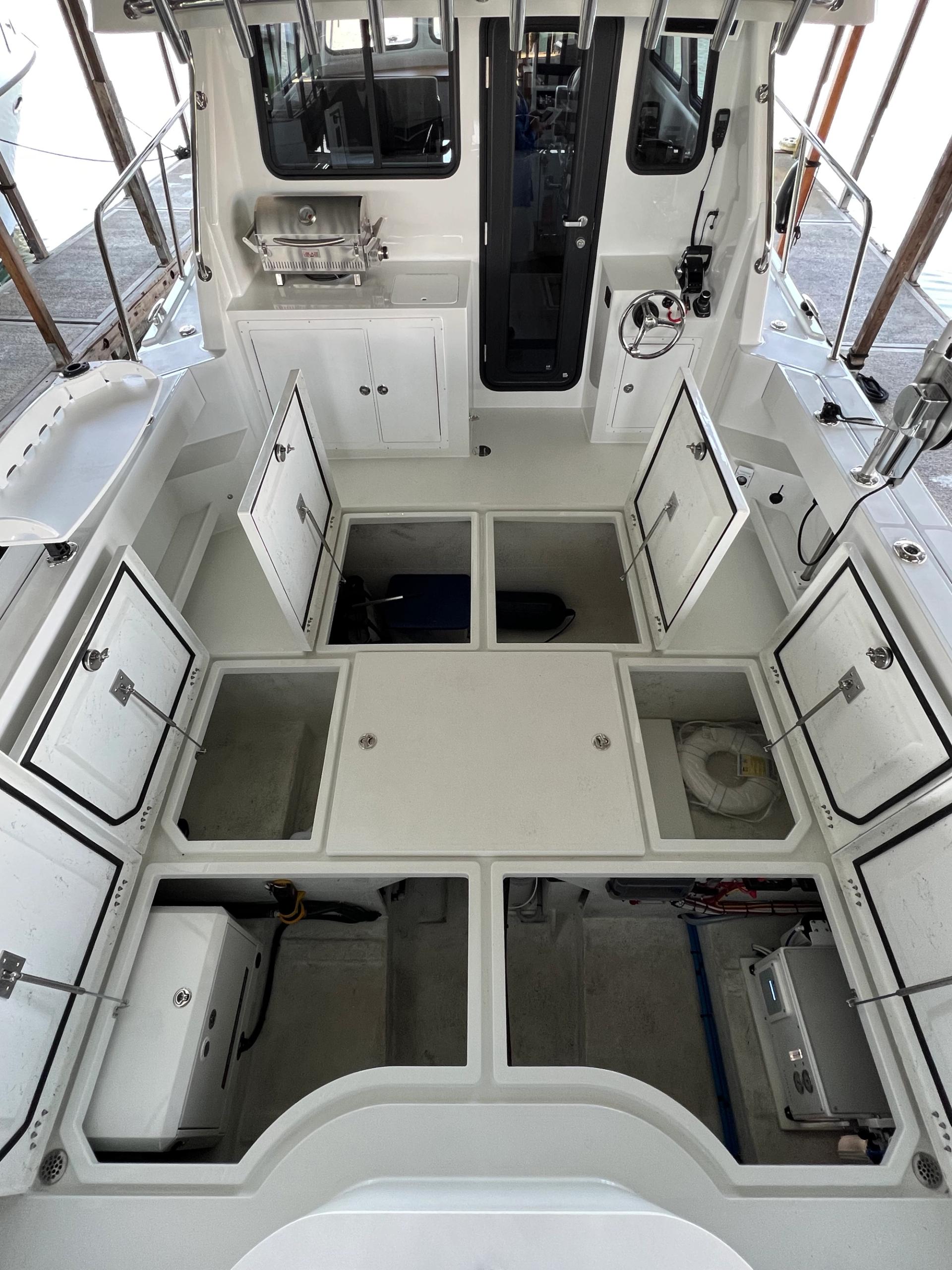 Lindell 41 cockpit viewed from above with hatches open and storage viewed