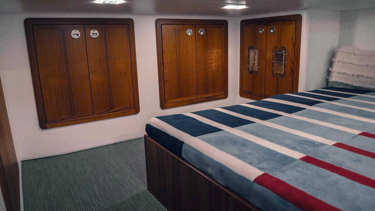 view of the cabinetry and storage spaces in the aft berth of lindell 41