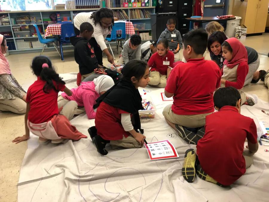 Students working together on a shared activity