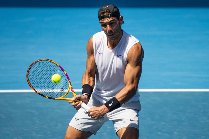 Nadal returning tennis