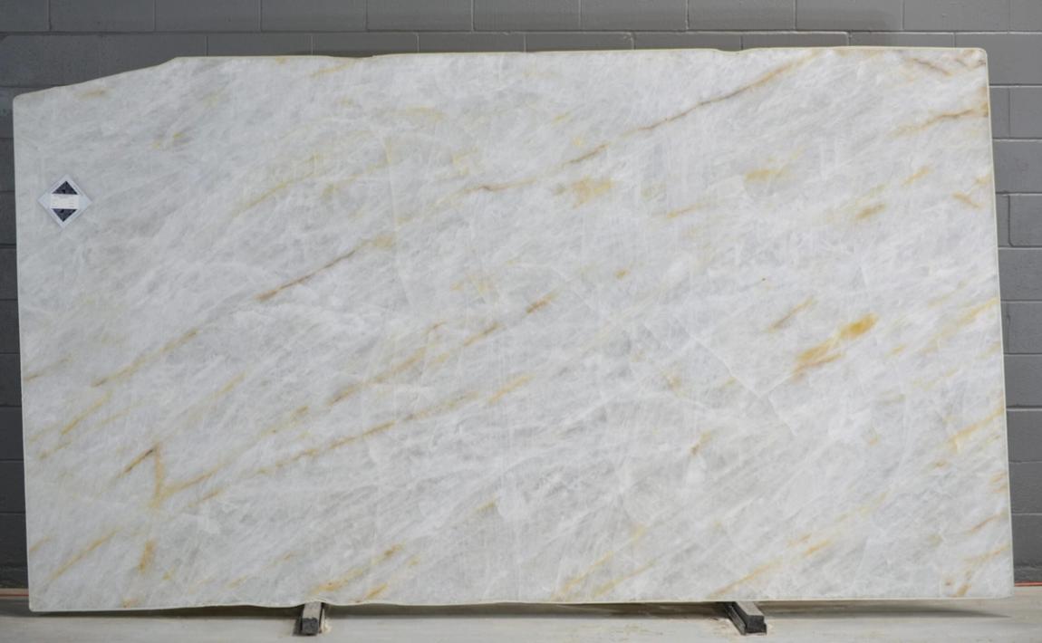 Cristallo Supreme Gold natural-stone slab installation