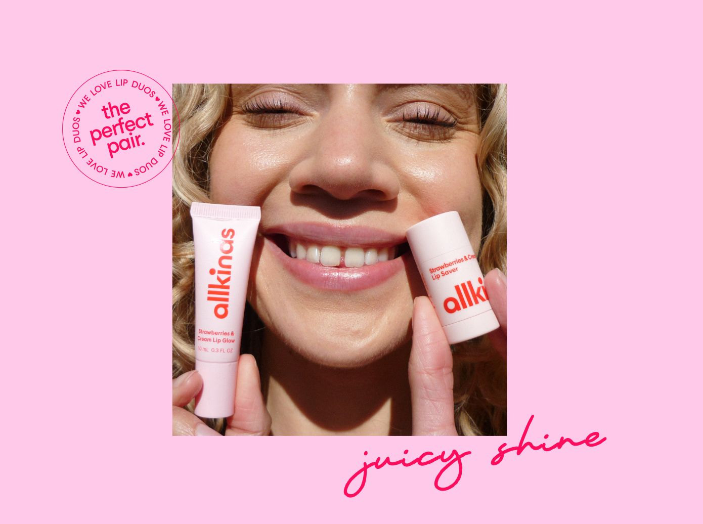 A person with a joyful expression and glossy lips holds a pink allkinas lip gloss and lip saver. Text reads "the perfect pair" and "juicy shine".