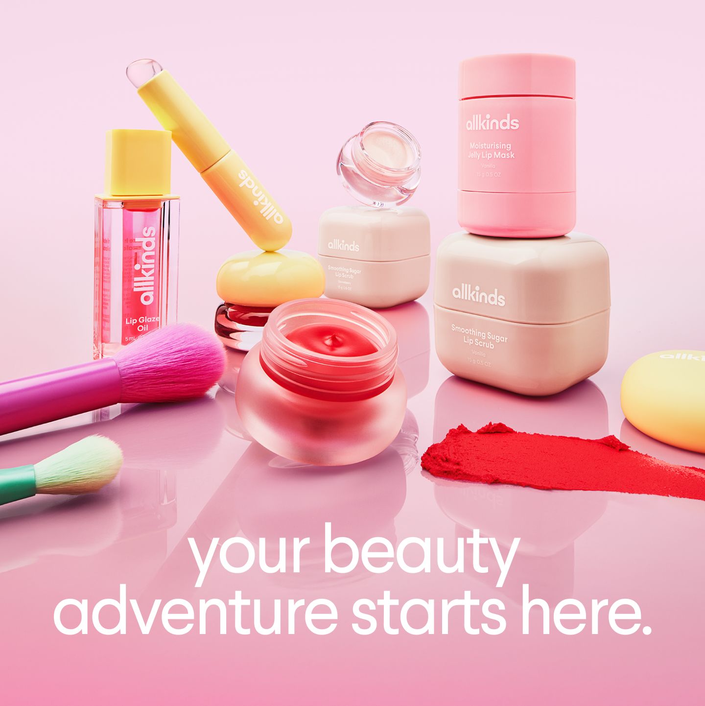 a pink background with a bunch of cosmetics and the words your beauty adventure starts here