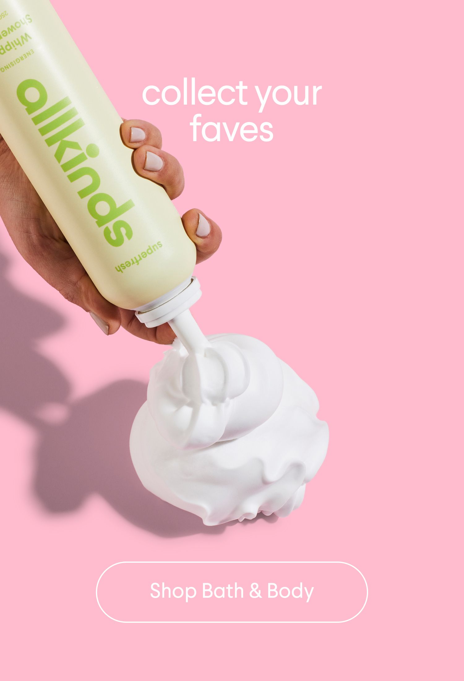 a person holding a bottle of allkinds whipped shower foam