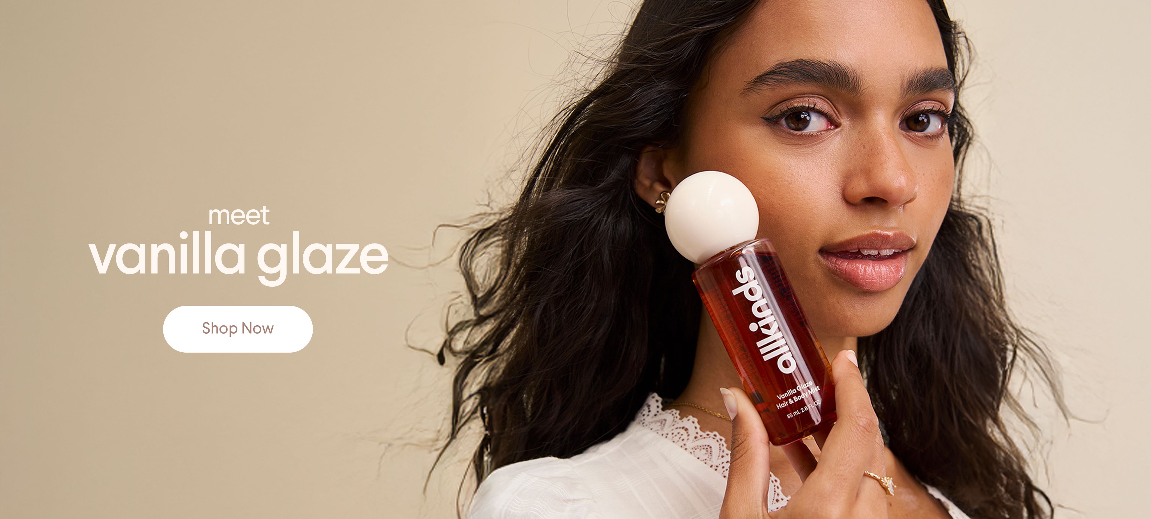 Woman holding an allkinds product bottle, with "meet vanilla glaze" text and "Shop Now" button.