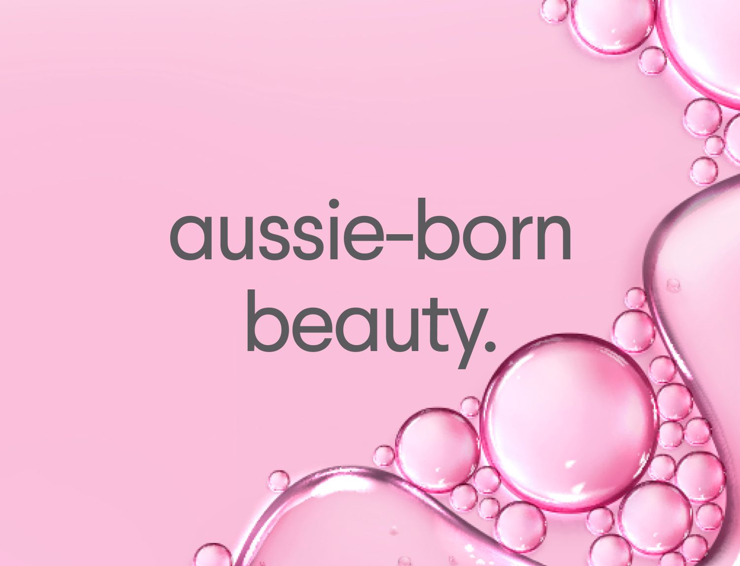 Text "aussie-born beauty." on a pink background with shiny pink bubbles.
