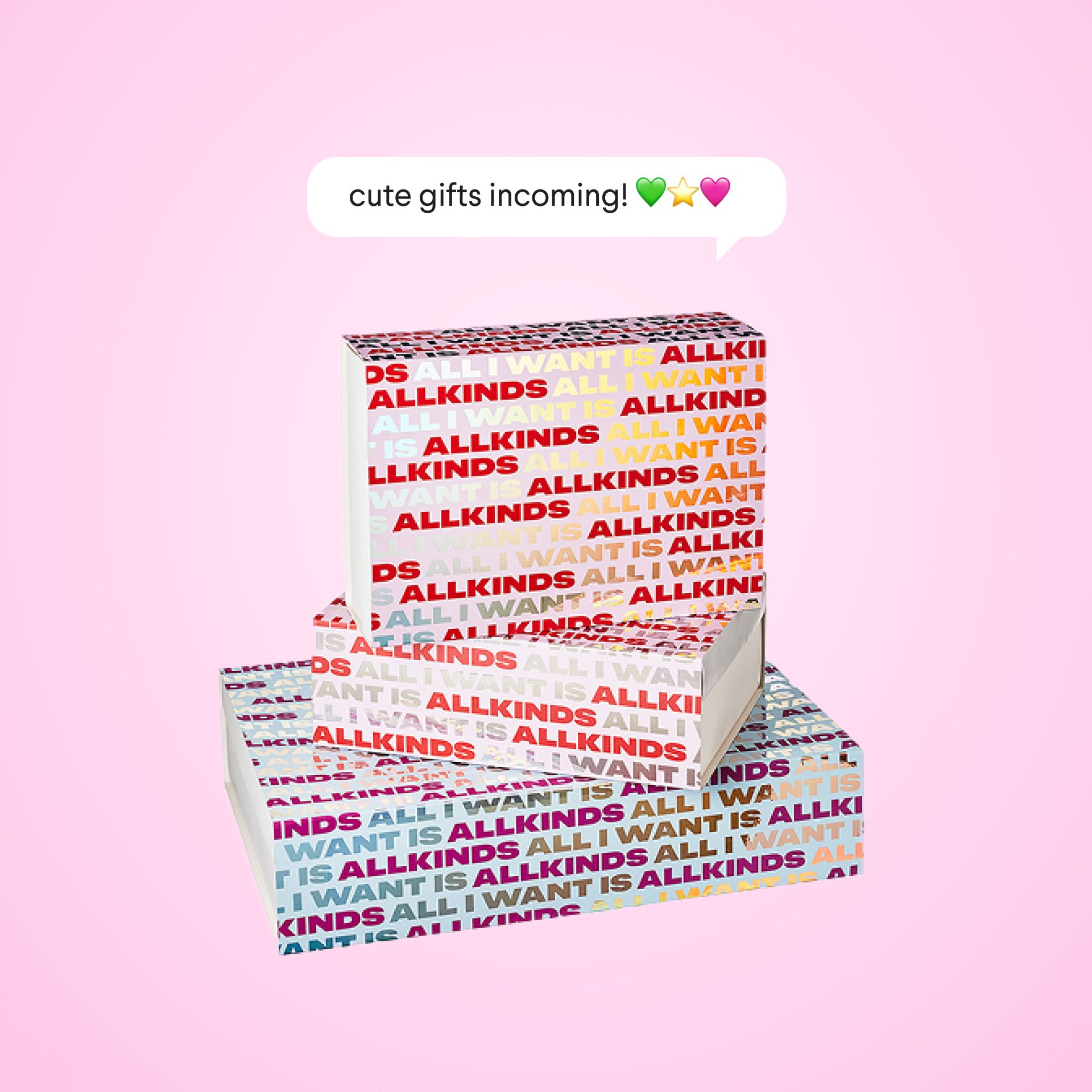 Two gift boxes wrapped in colorful "ALL I WANT IS ALLKINDS" text on a pink background, with a speech bubble saying "cute gifts incoming! 💚💖".