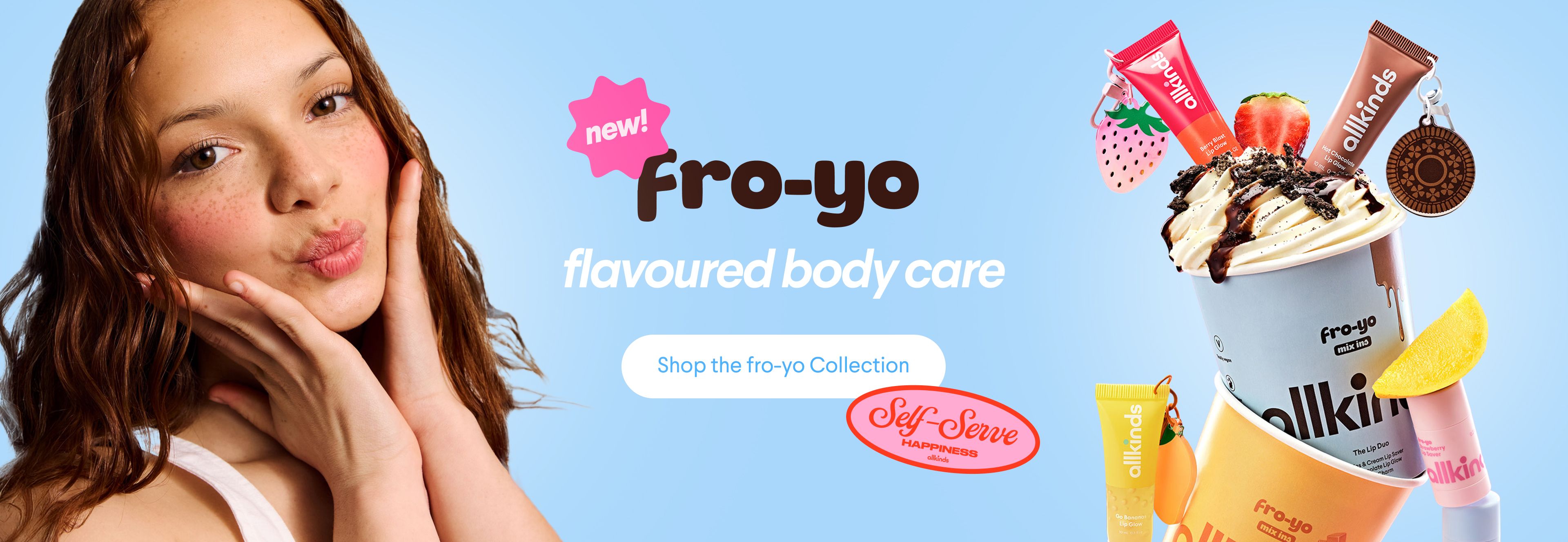 Ad for 'Fro-yo flavoured body care' showing a woman, products resembling frozen yogurt, and text 'new!' and 'Self-Serve Happiness'.
