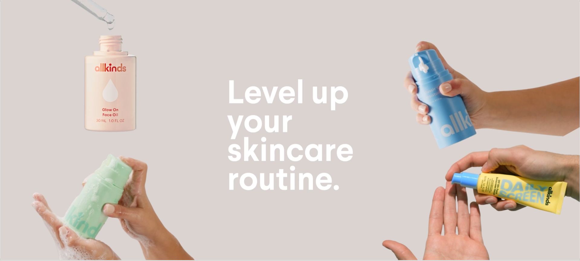 a group of people are holding bottles of skincare products in their hands .