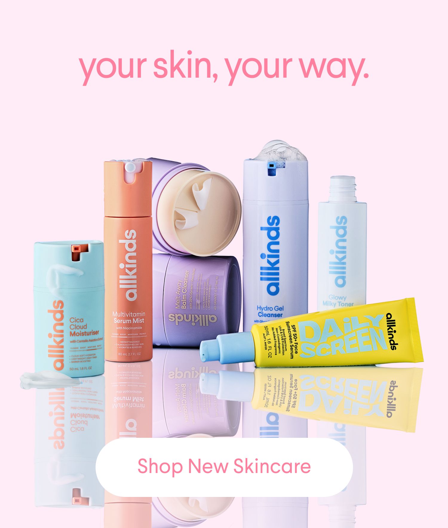 An assortment of colorful Allkinds skincare products on a reflective surface.