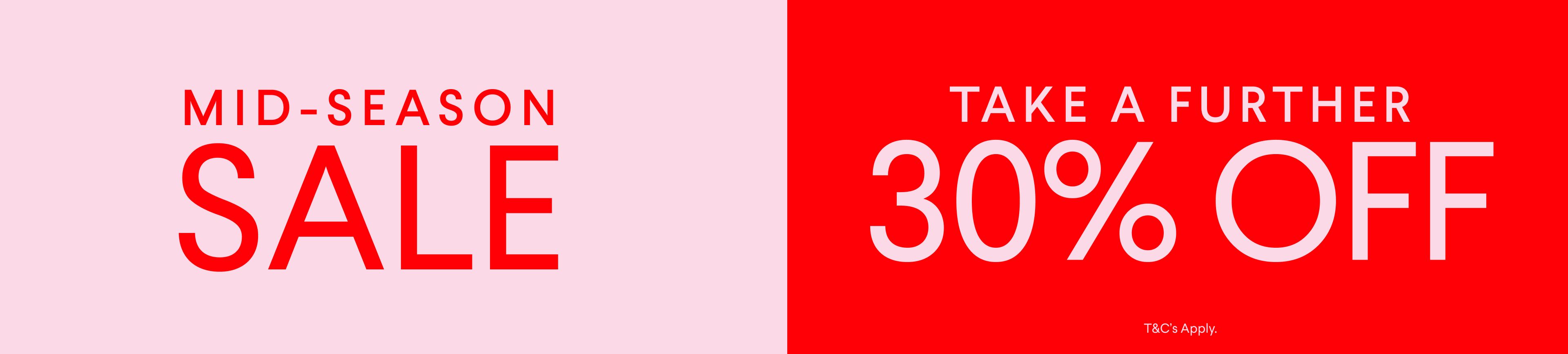 a red sign that says mid-season sale and take a further 30 % off