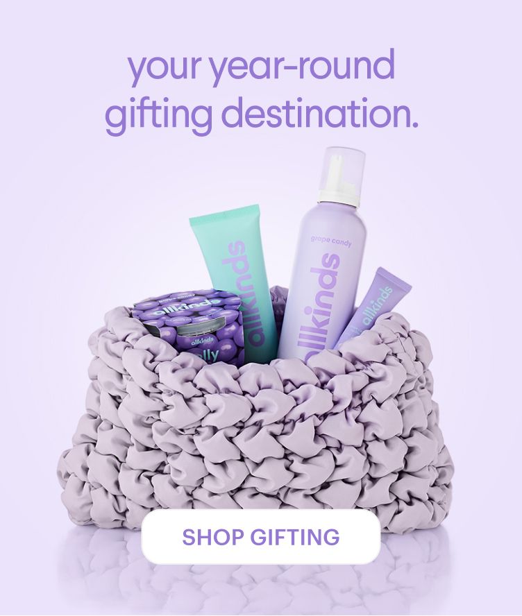 A ruffled lavender basket contains 'allkinds' beauty products and grape candy. Text reads: 'your year-round gifting destination.' A 'SHOP GIFTING' button is below.