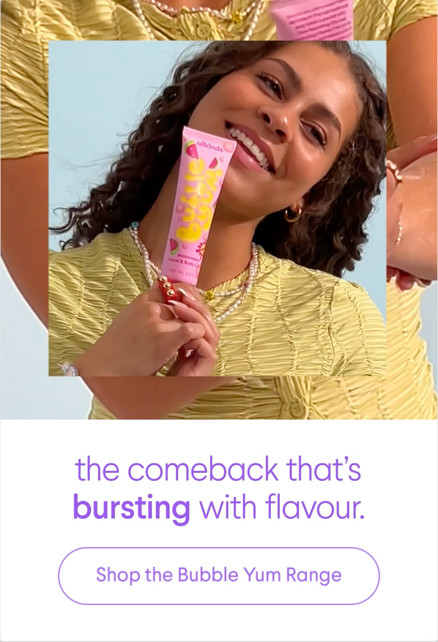 a woman holding a tube of bubble yum lip balm