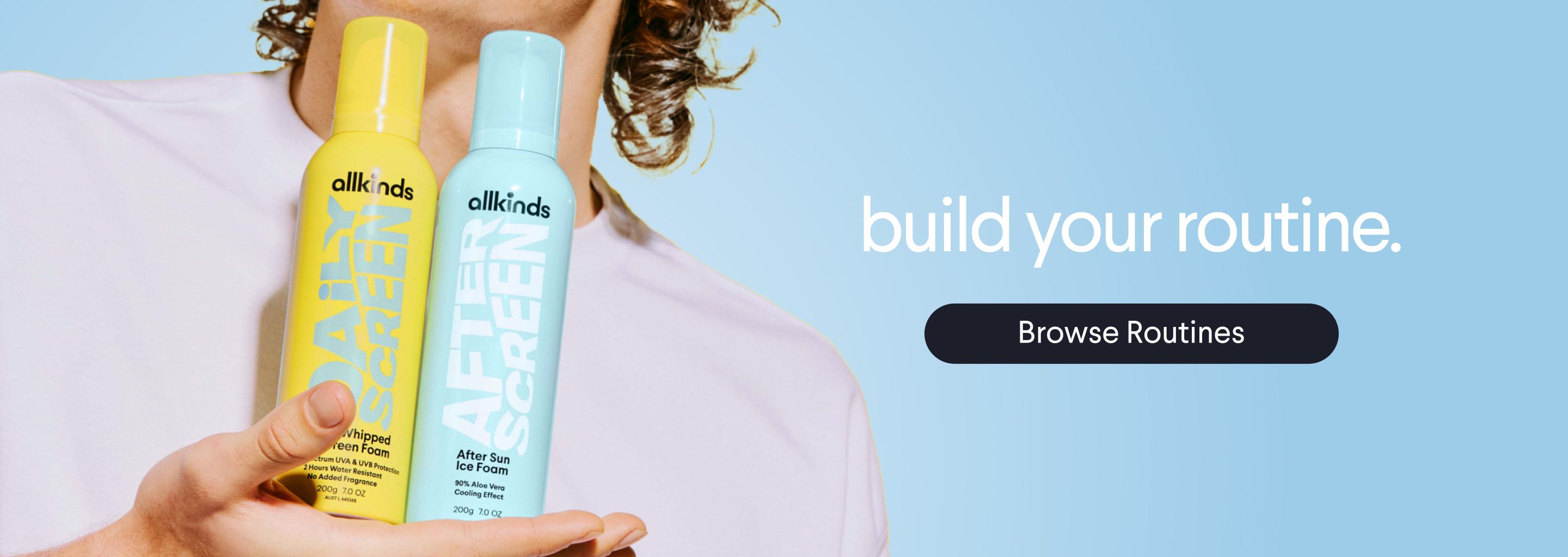 a person is holding three bottles of hair products in their hands .