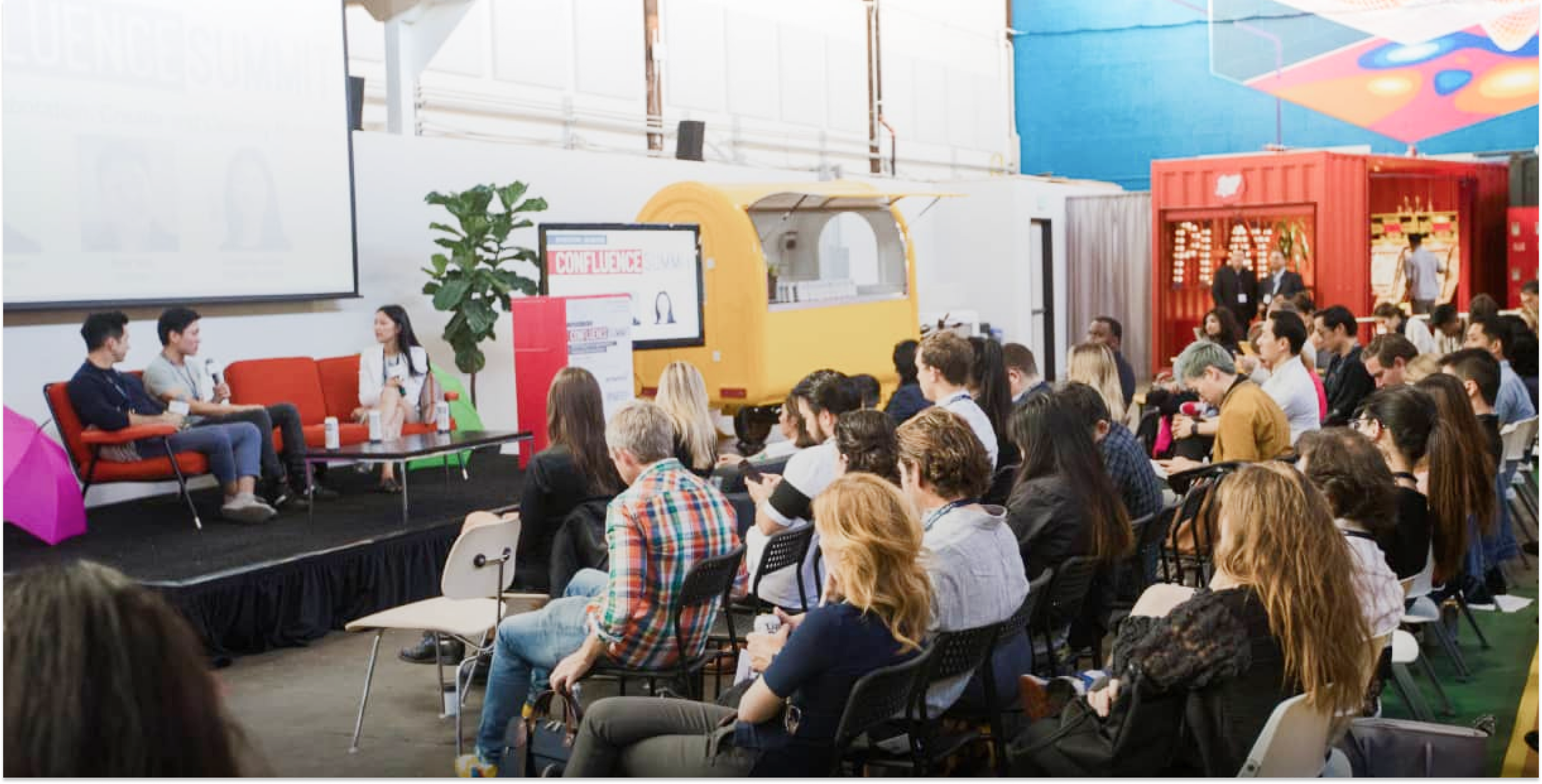 people in audience and on stage at an event