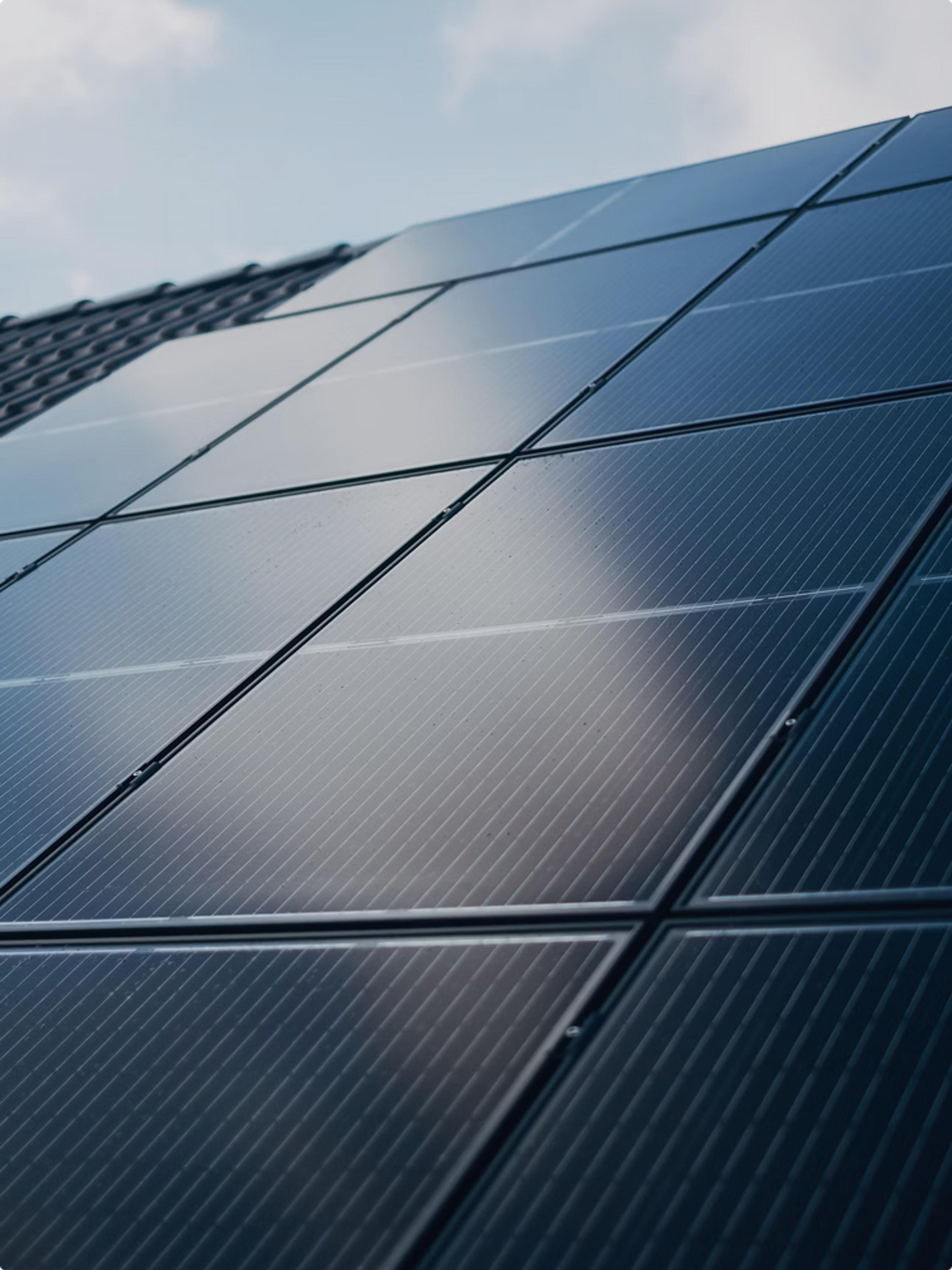 An array of solar panels installed on a building