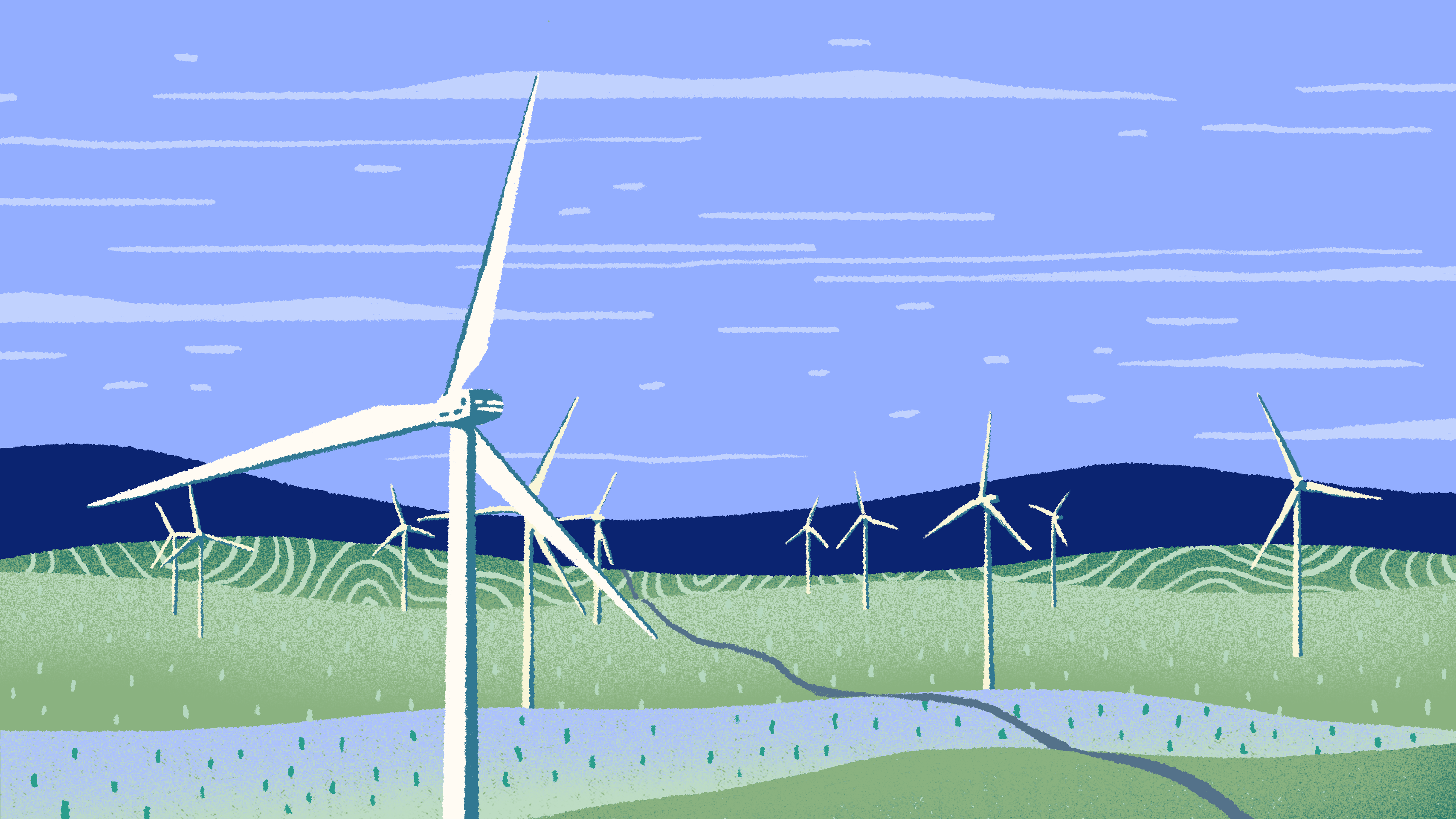 wind turbines against mountain backdrop