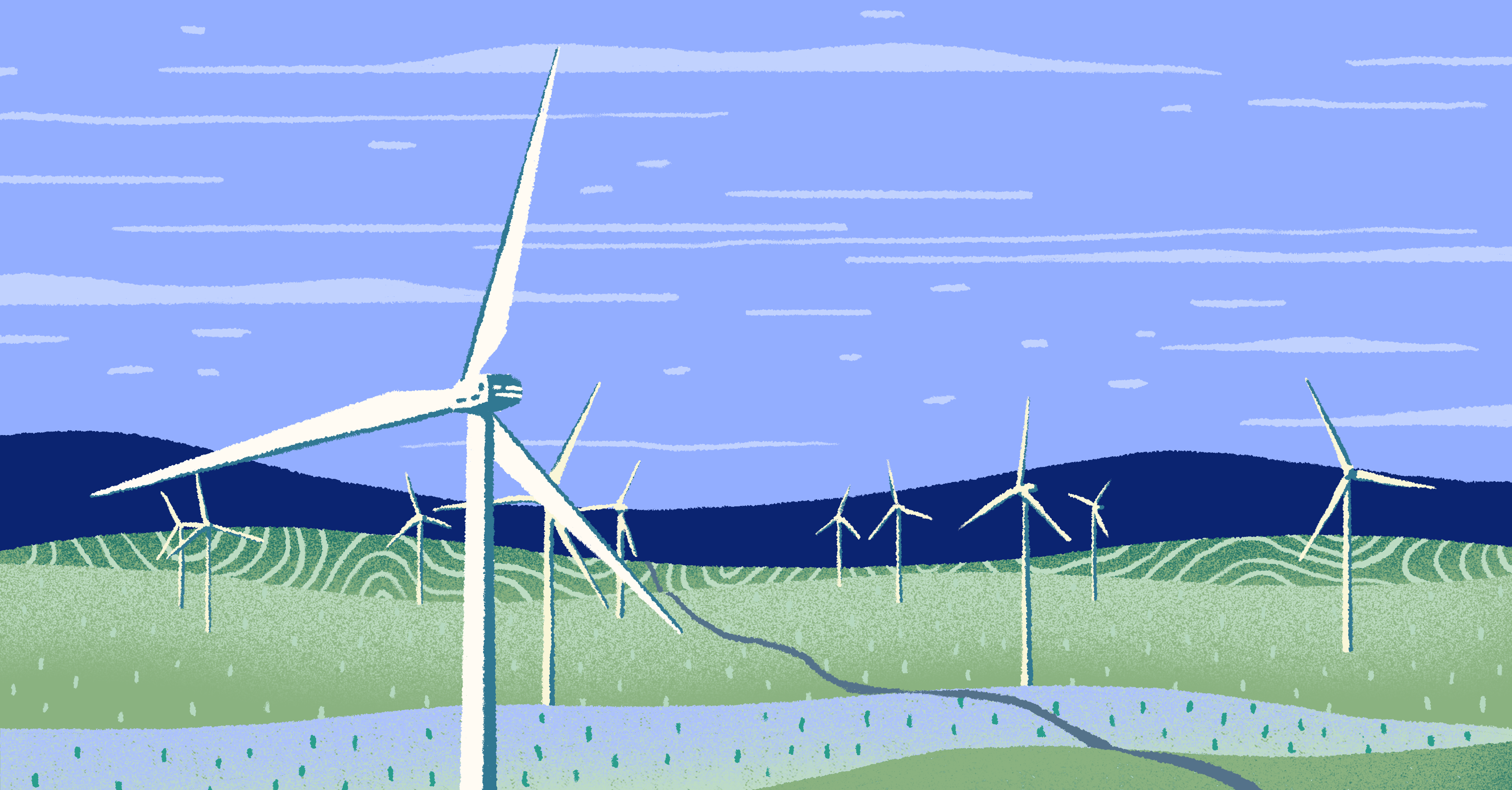 wind turbines against mountain backdrop