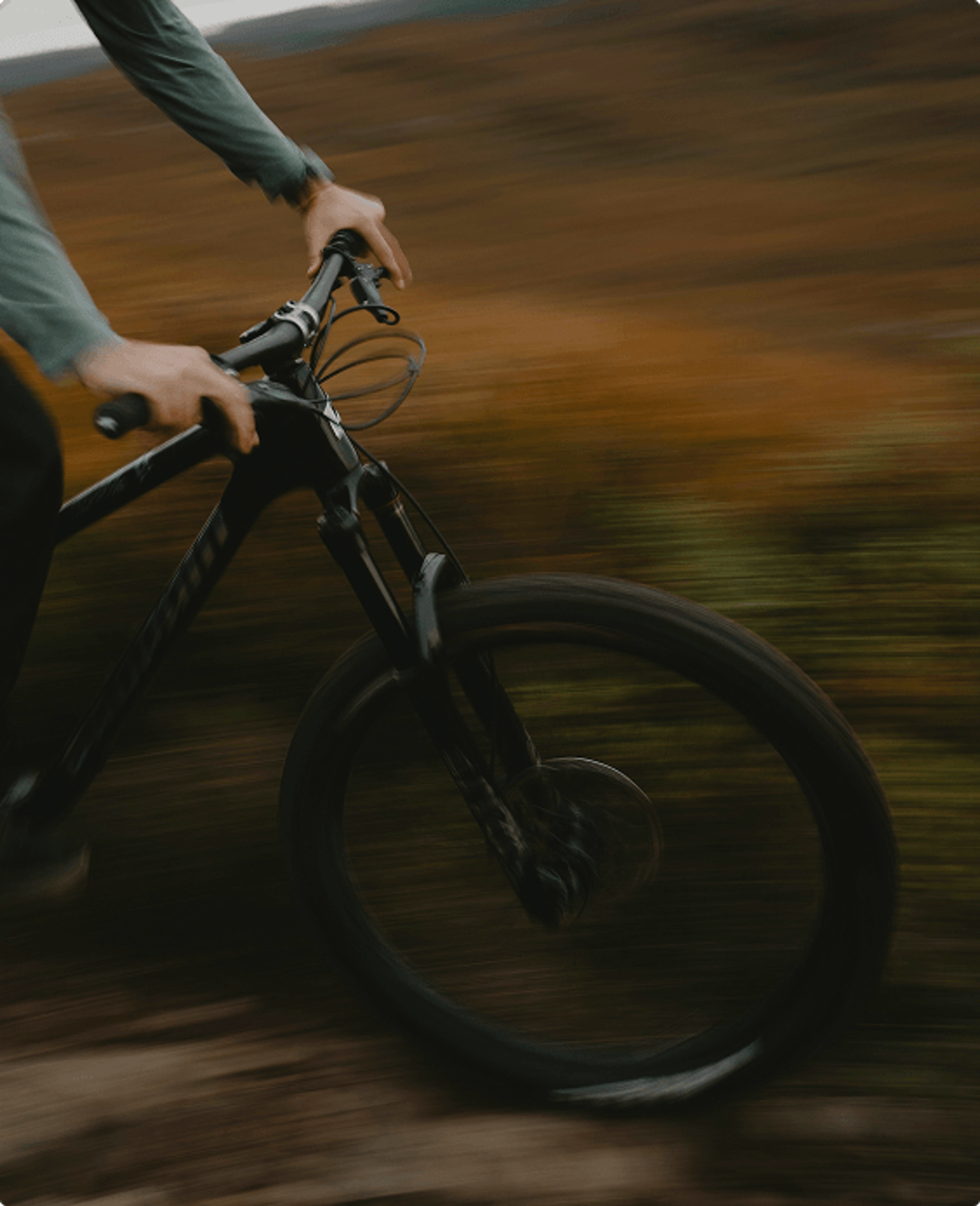 Person mountain biking