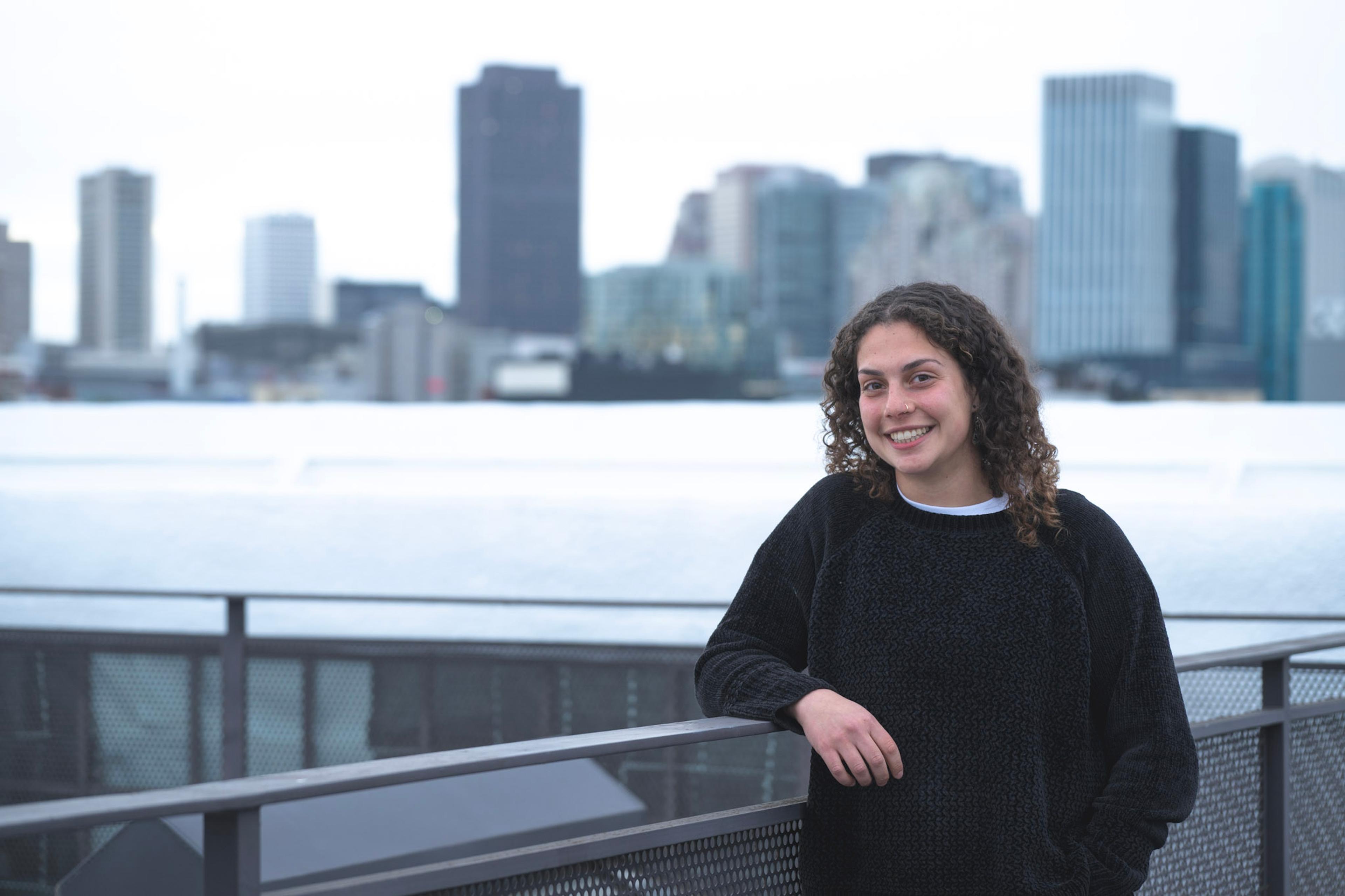 Photo of Aviva with a city skyline behind