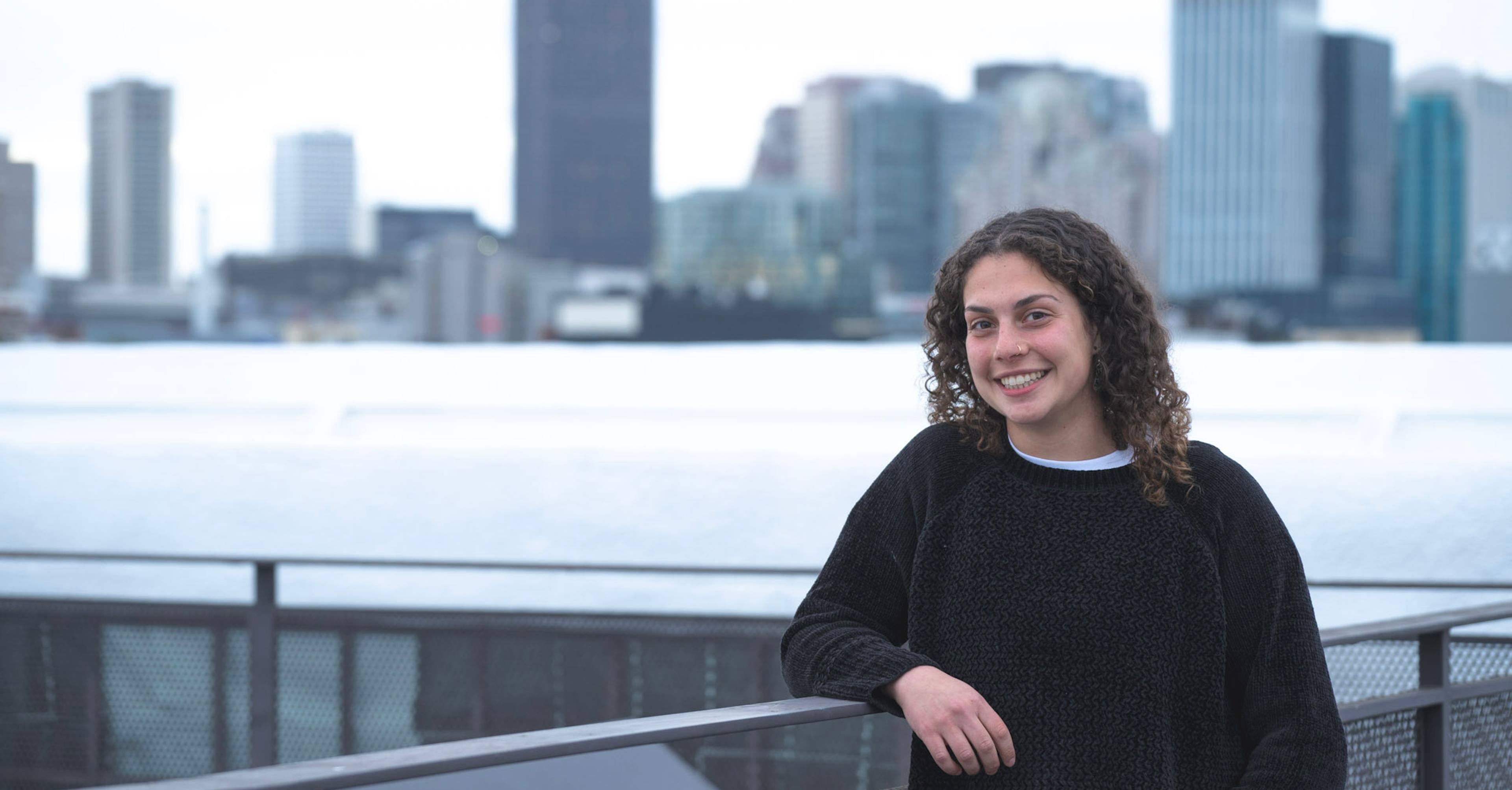 Photo of Aviva with a city skyline behind
