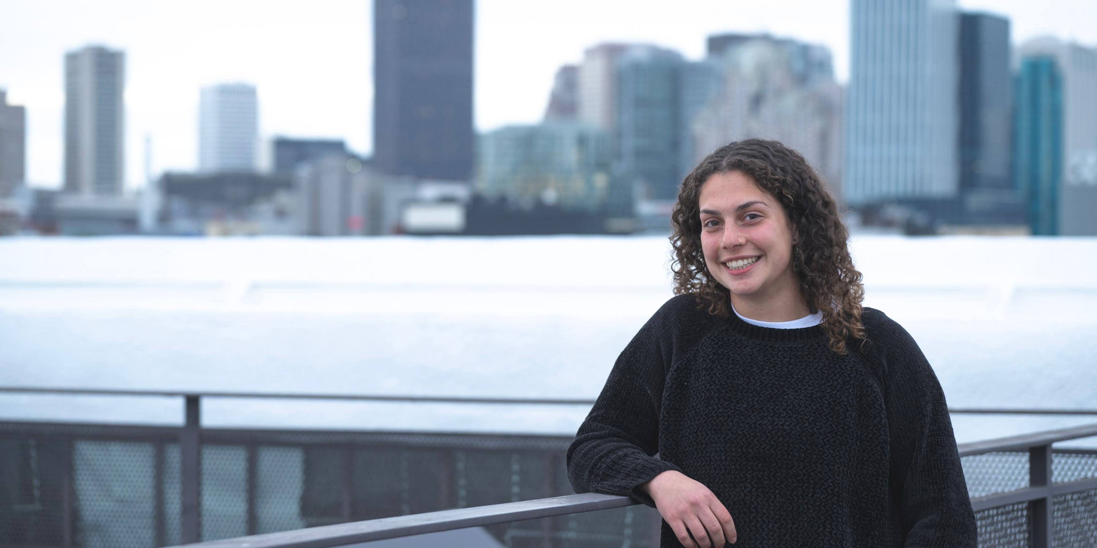 Photo of Aviva with a city skyline behind