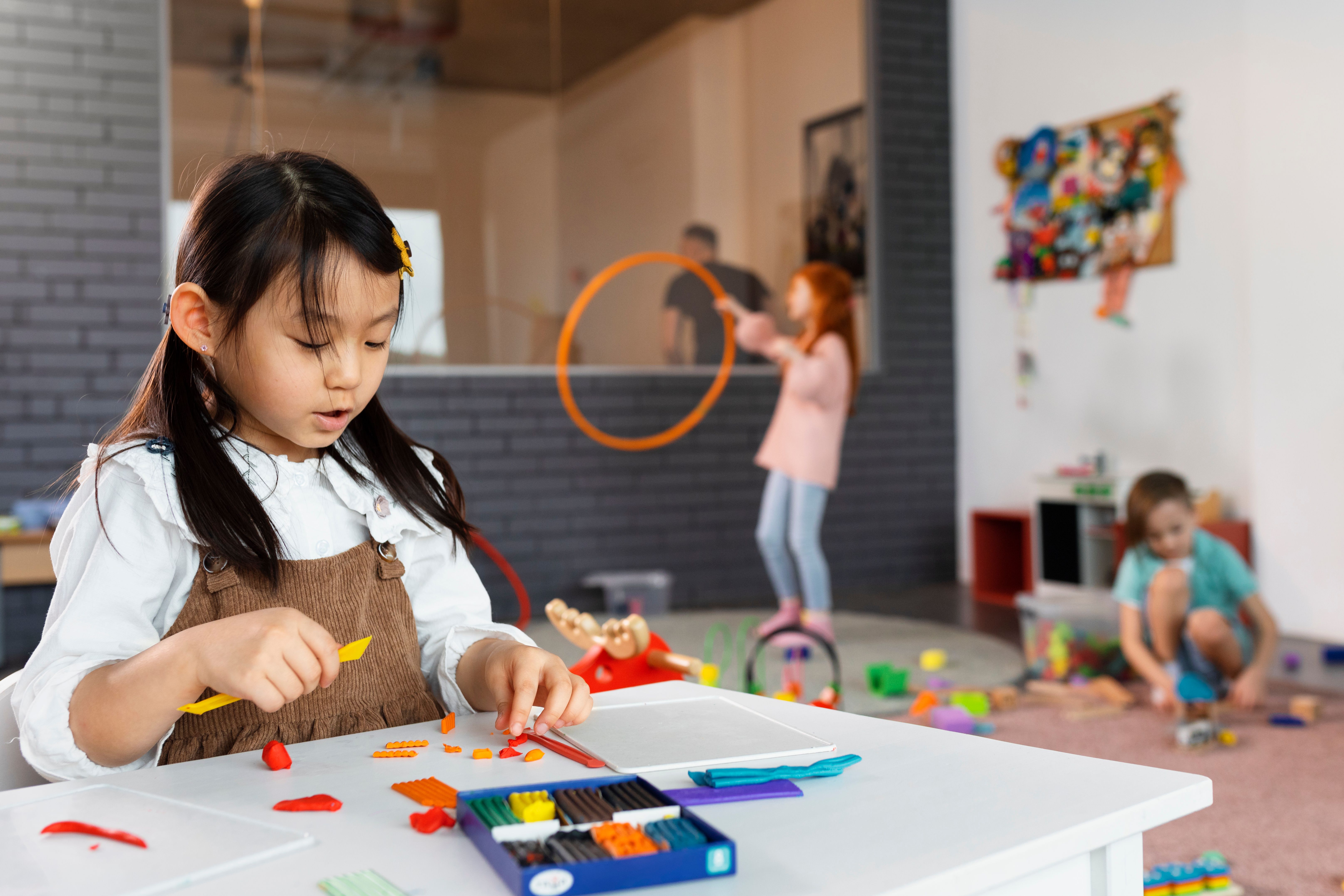 girl playing with toys