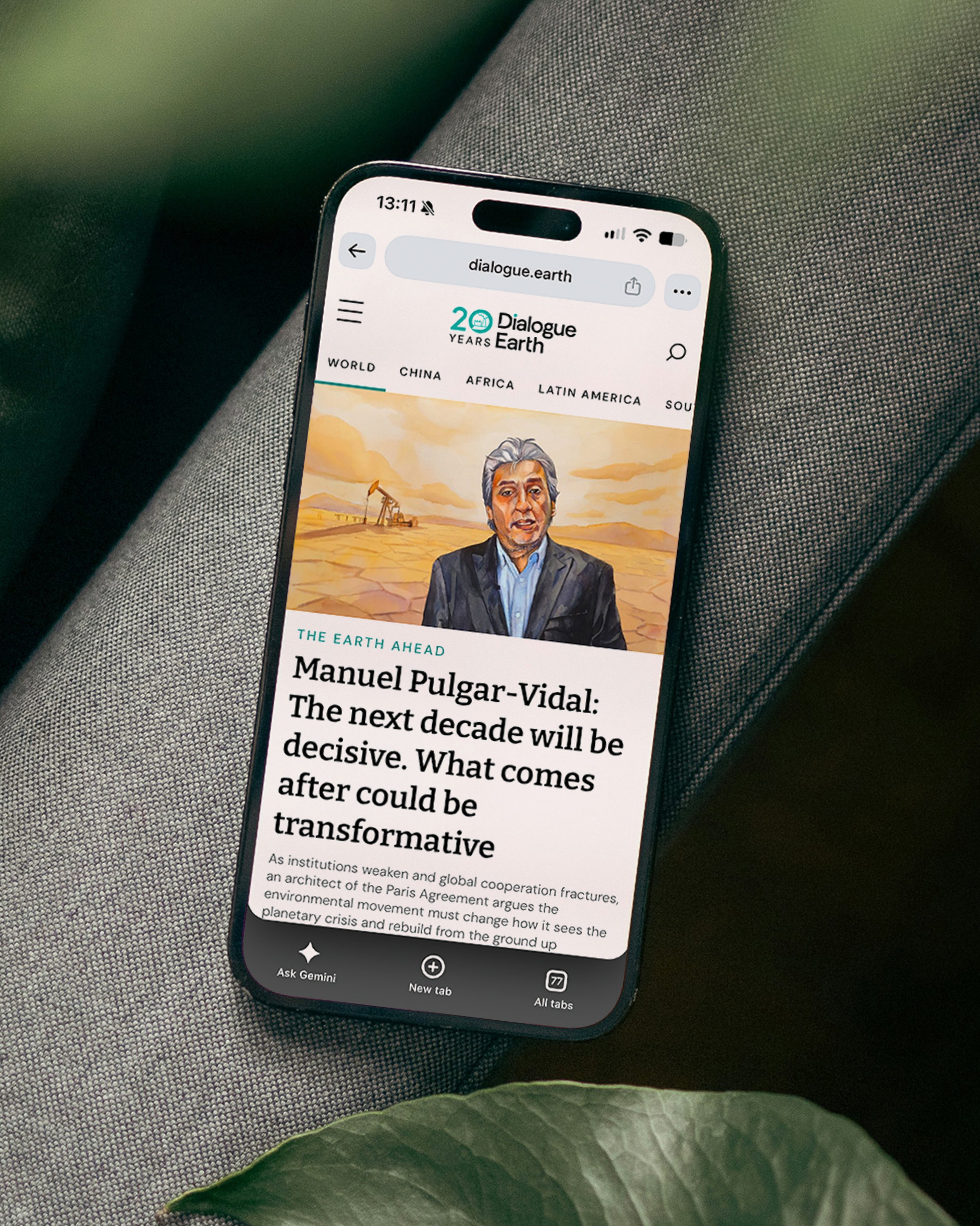 A Dialogue Earth article on a phone