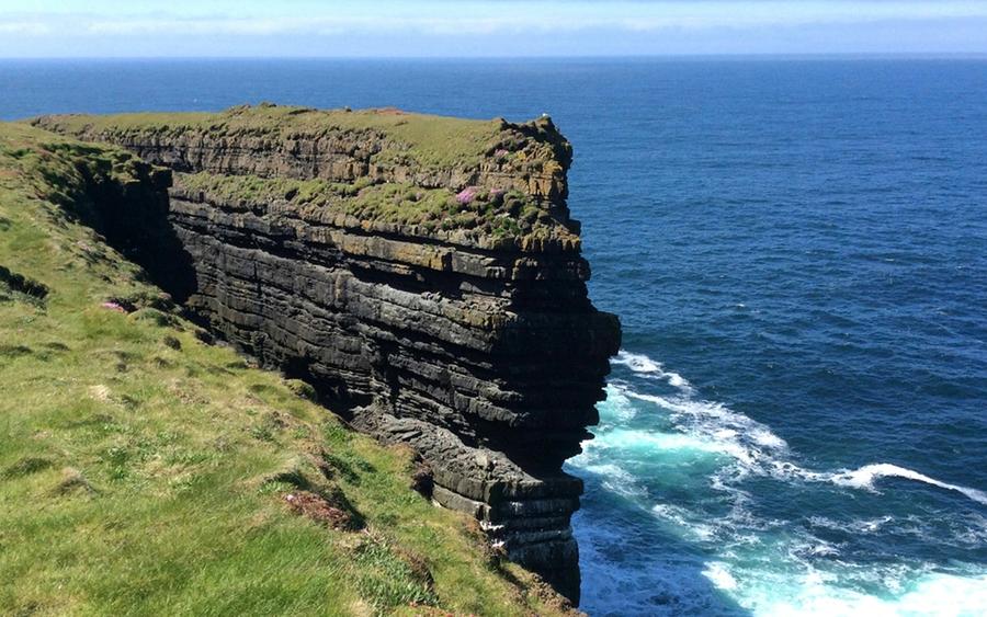 Atlantic sea cliffs meeting the ocean at Loop Head, County Clare.