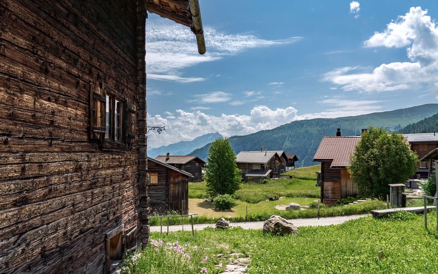 Wooden alpine houses in a mountain village