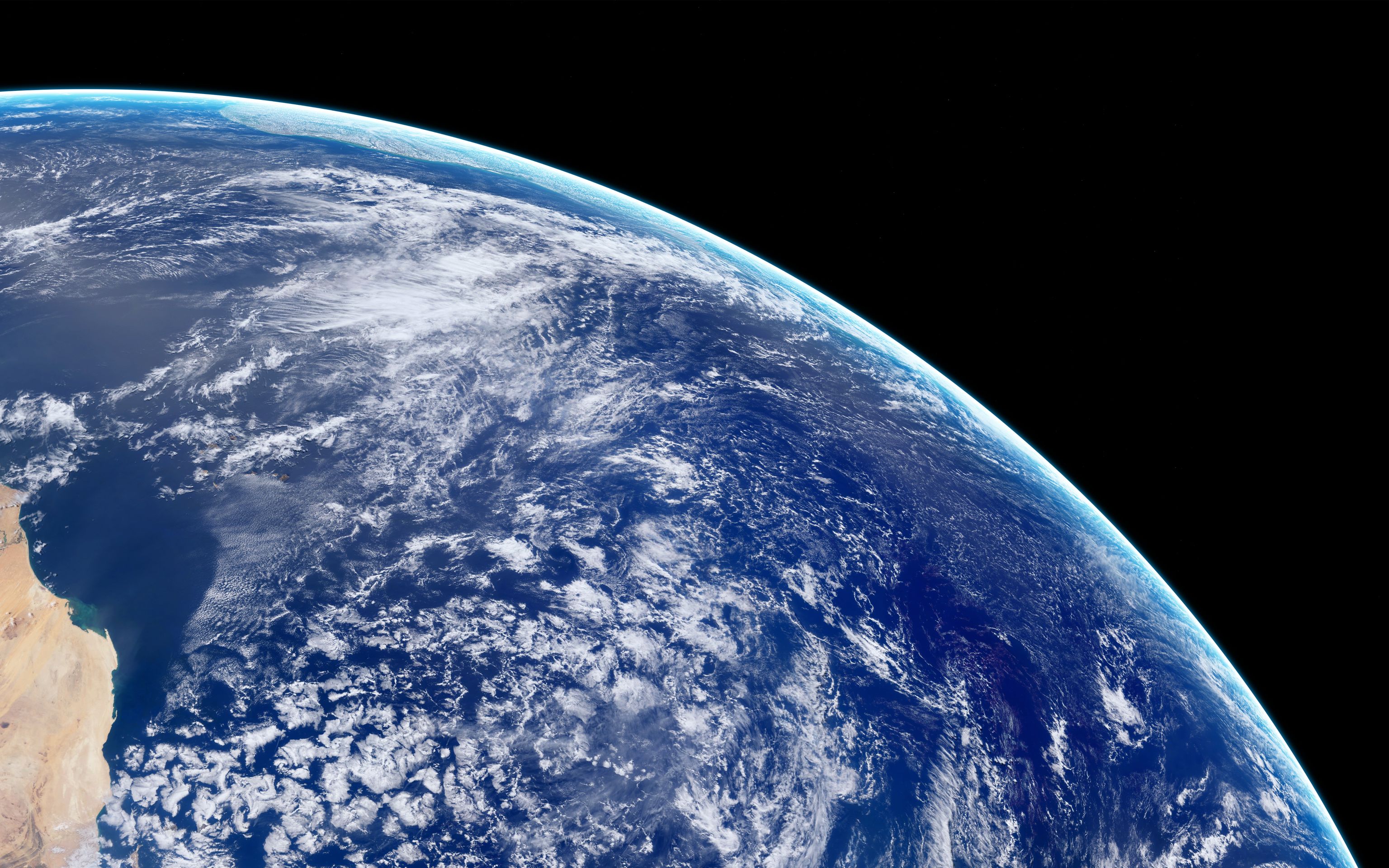 a view of the earth from space shows the oceans and clouds .