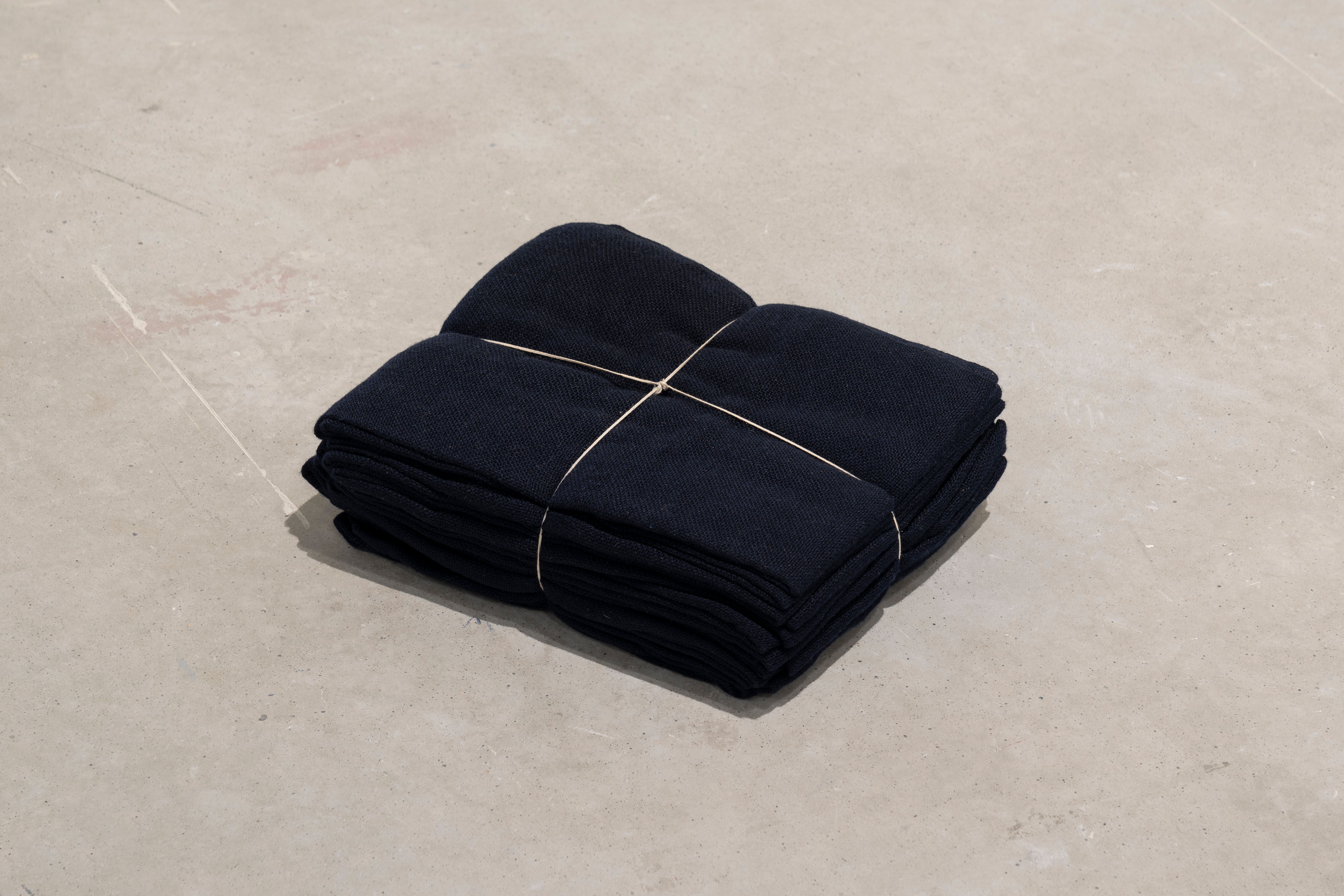 Jason Dodge, In Turin, Cristina Donato wove merino wool yarn that is the color of night and a length equaling the distance from the earth to above the weather, 2013