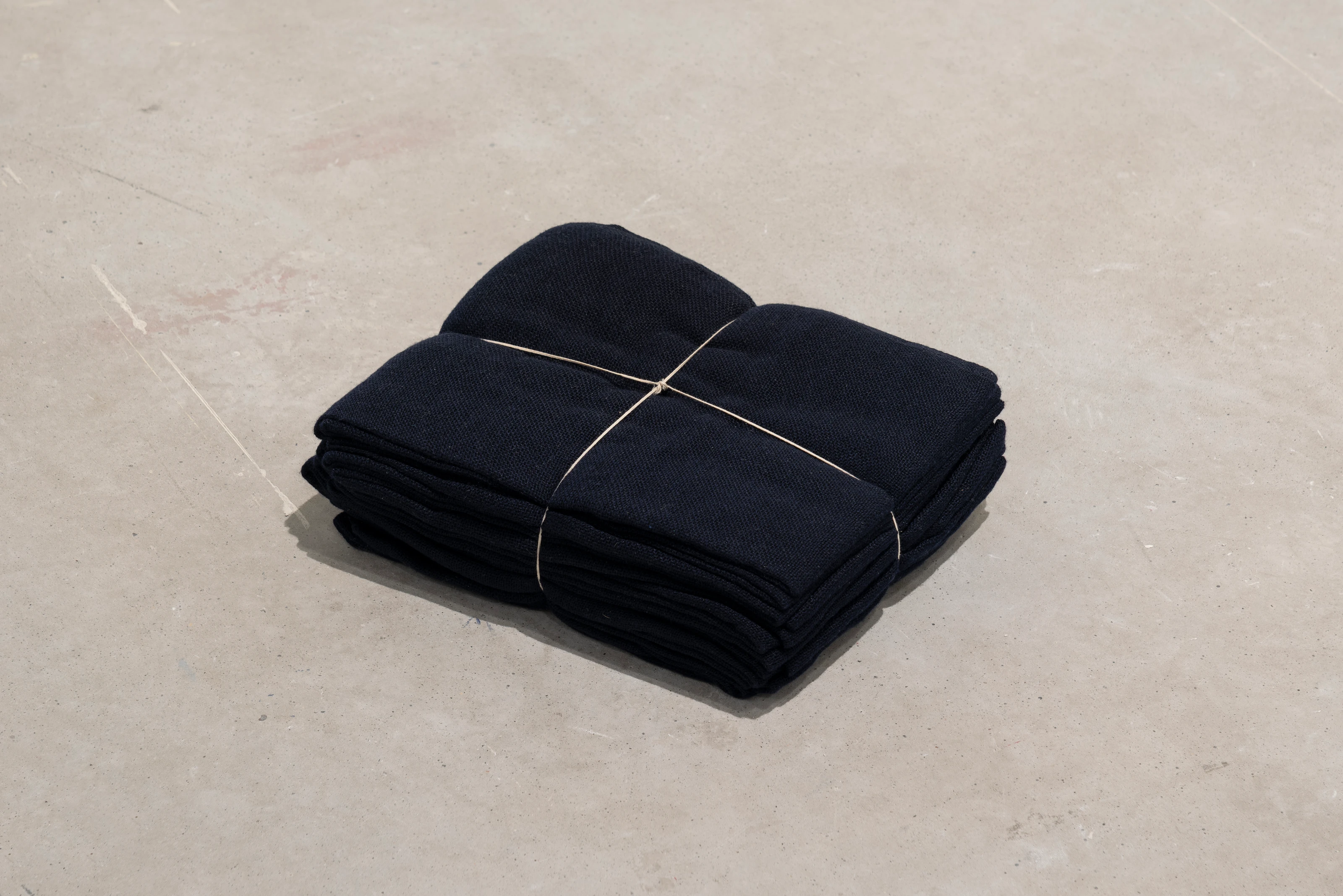Jason Dodge, In Turin, Cristina Donato wove merino wool yarn that is the color of night and a length equaling the distance from the earth to above the weather, 2013