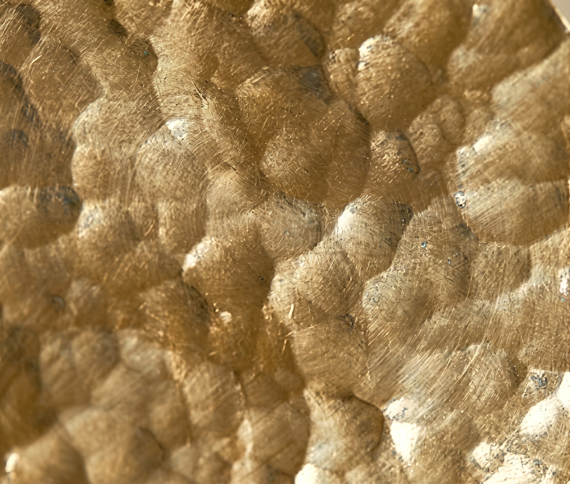 Close-up of hammered brass
