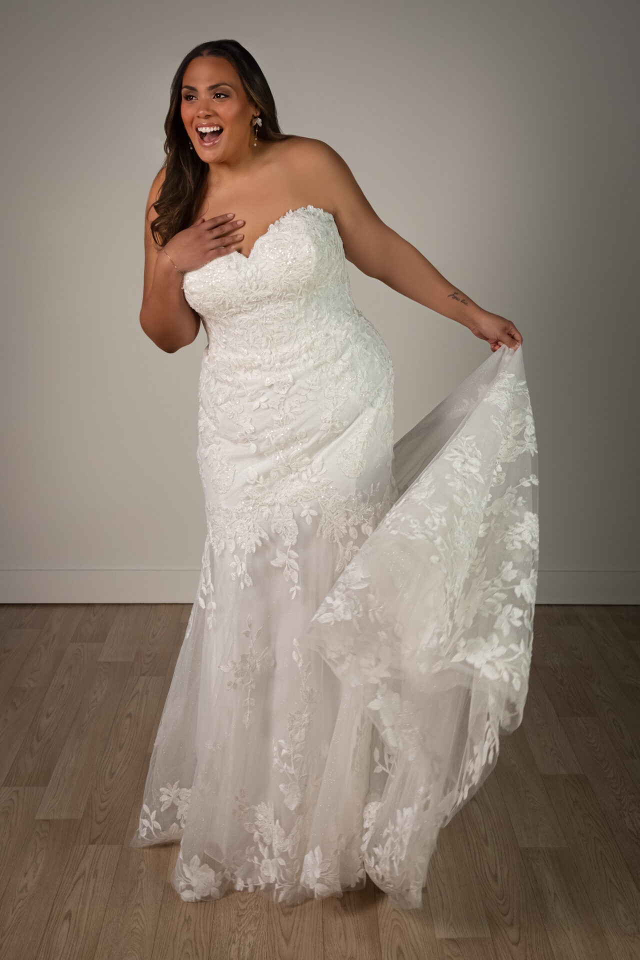 Shimmering Lace and Tulle Trumpet Wedding Gown with Sequin Floral Appliqués