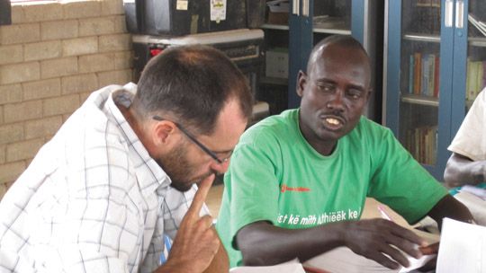 Vince Ward working with a local leader in South Sudan