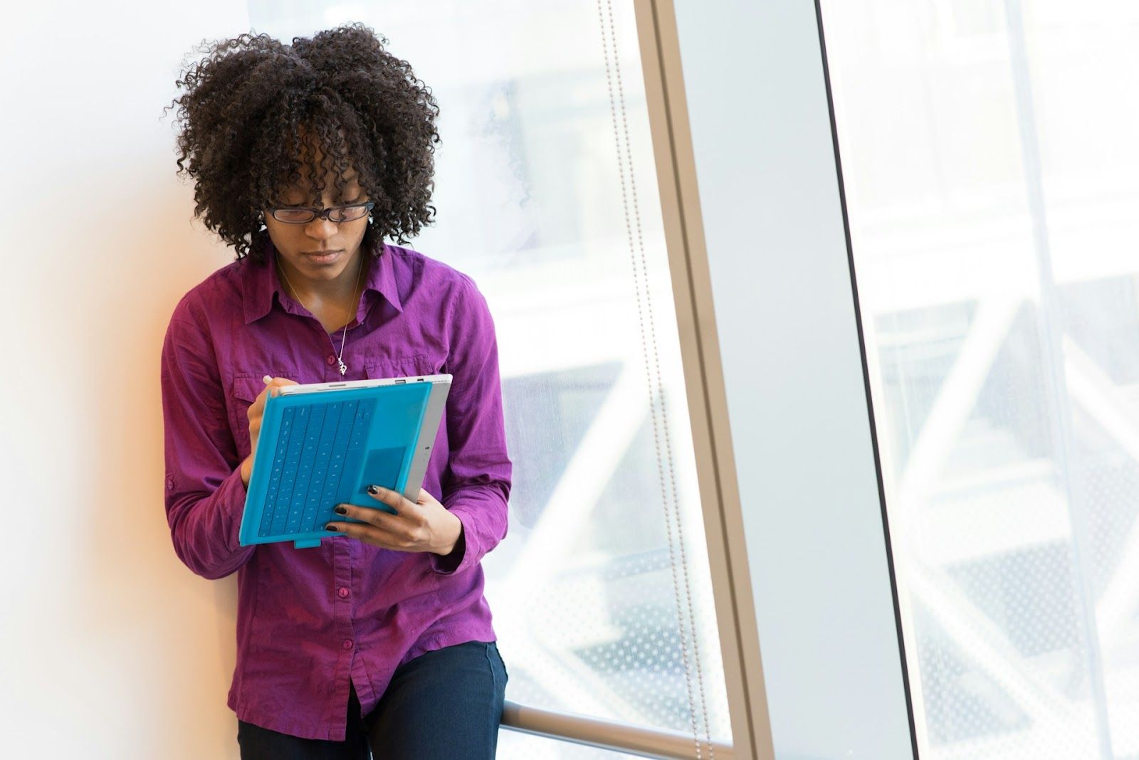 educator making a rubric on tablet