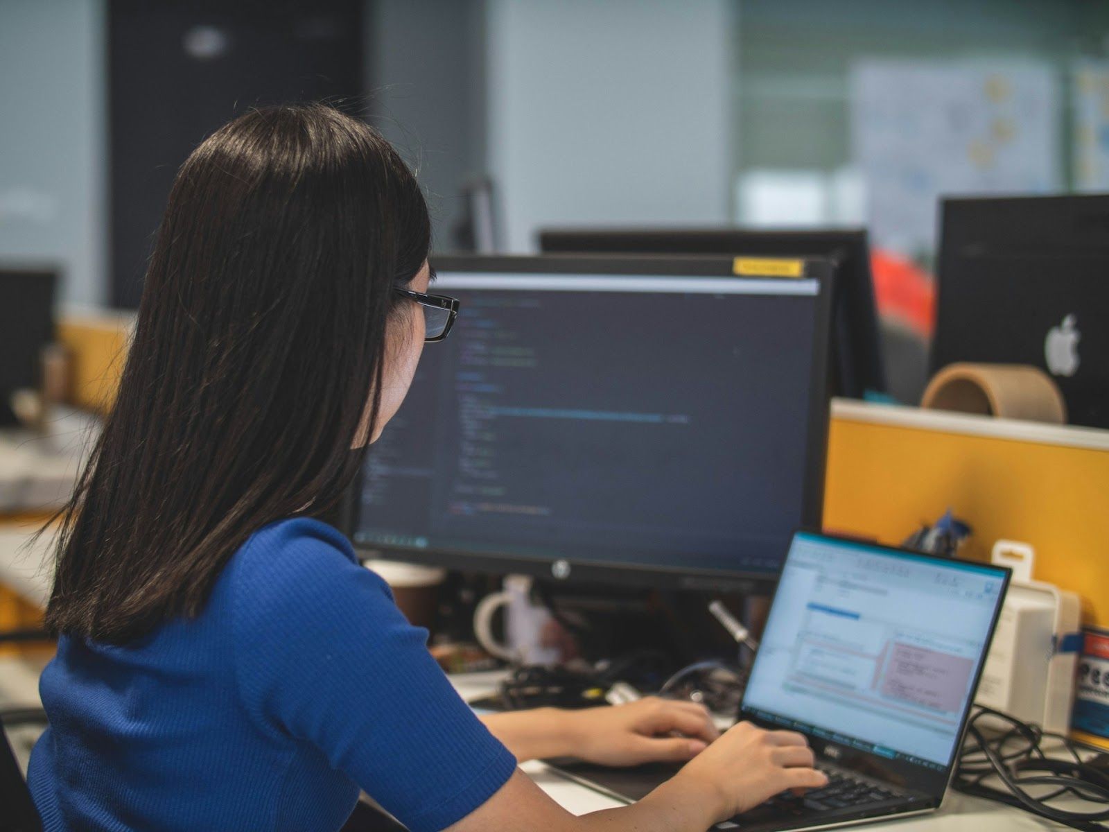 woman working away on gamified learning