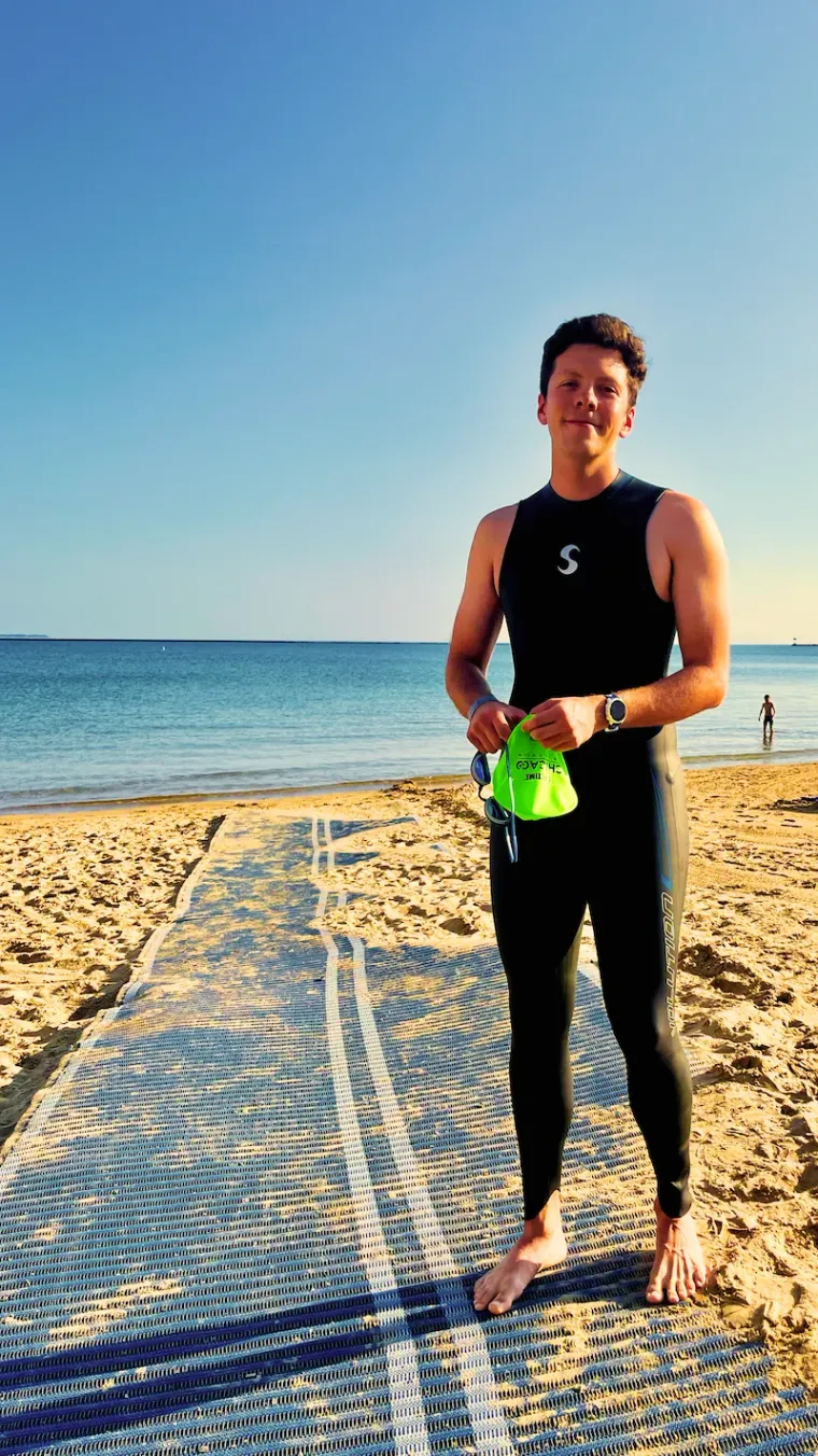 Man in wetsuit at the Ohio Street Beach in Chicago