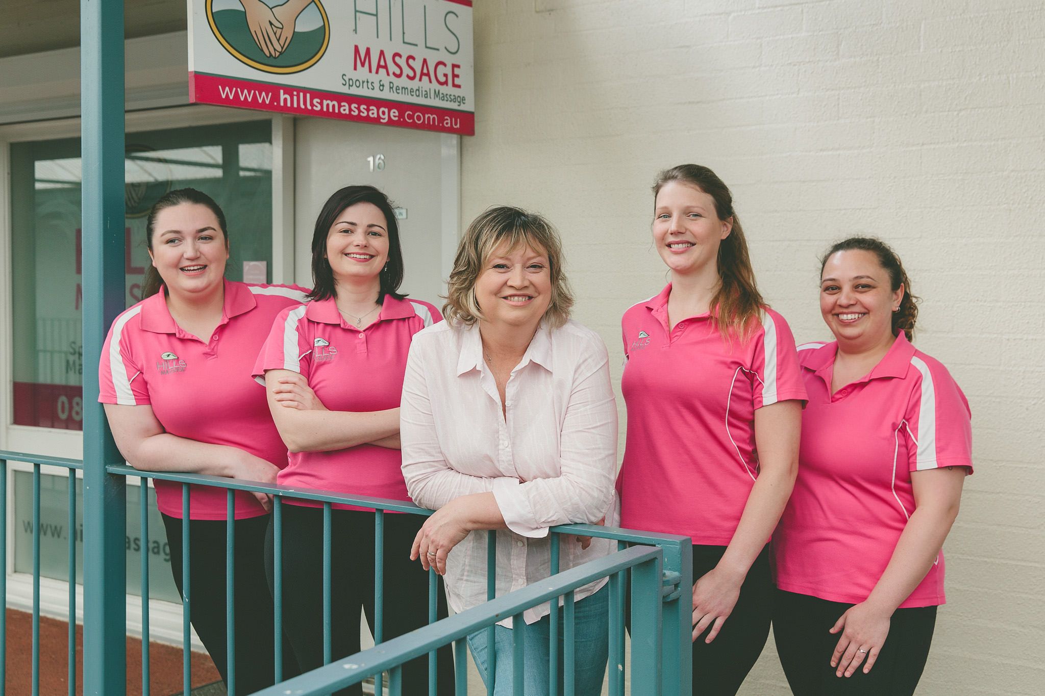 Hills massage team in front of business