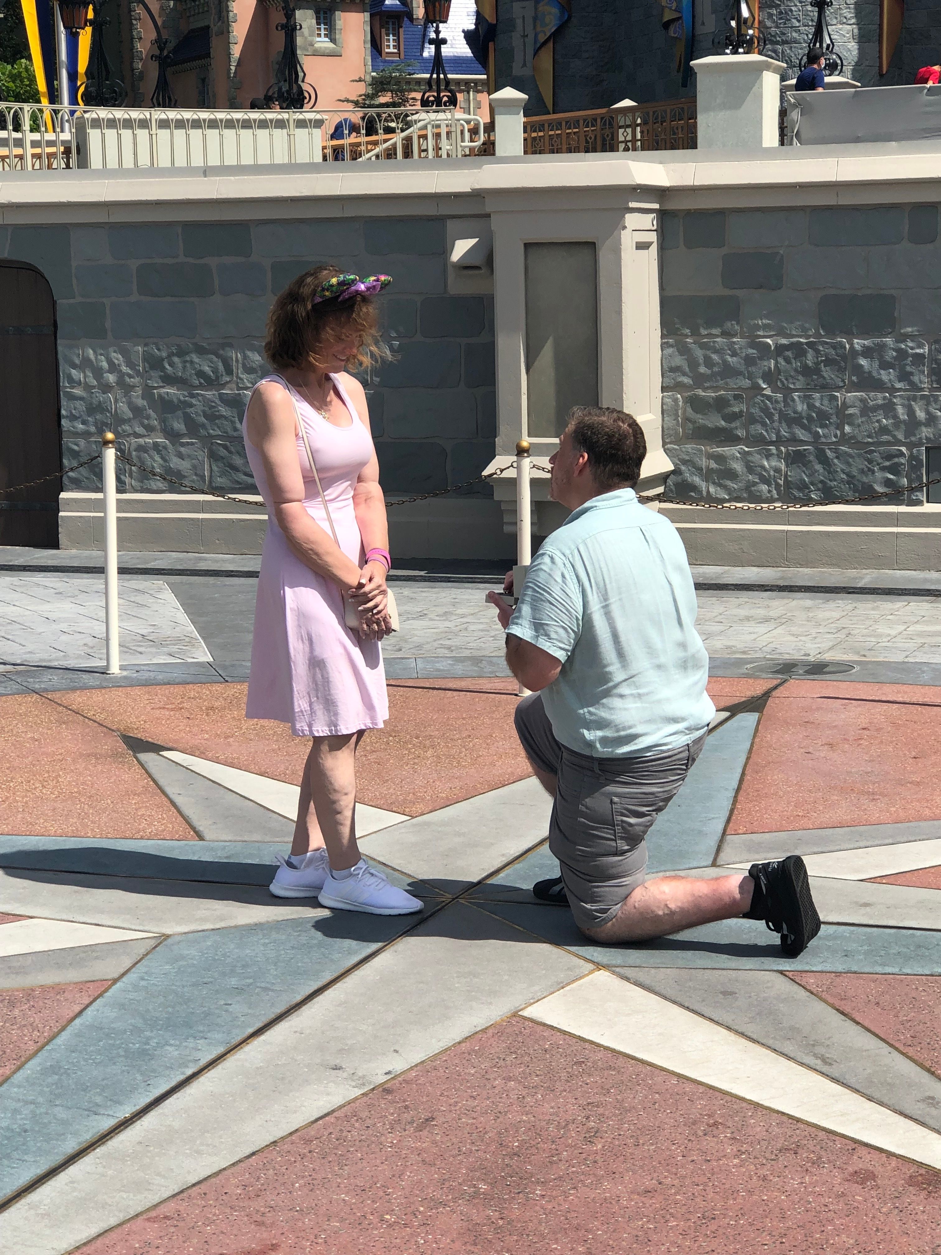 Bart from Cliniko proposing to his fiancee Alycia at Disneyworld.