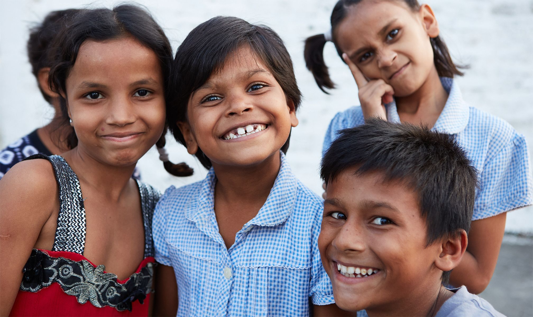 Smiling kids at a Beyond the Orphanage home