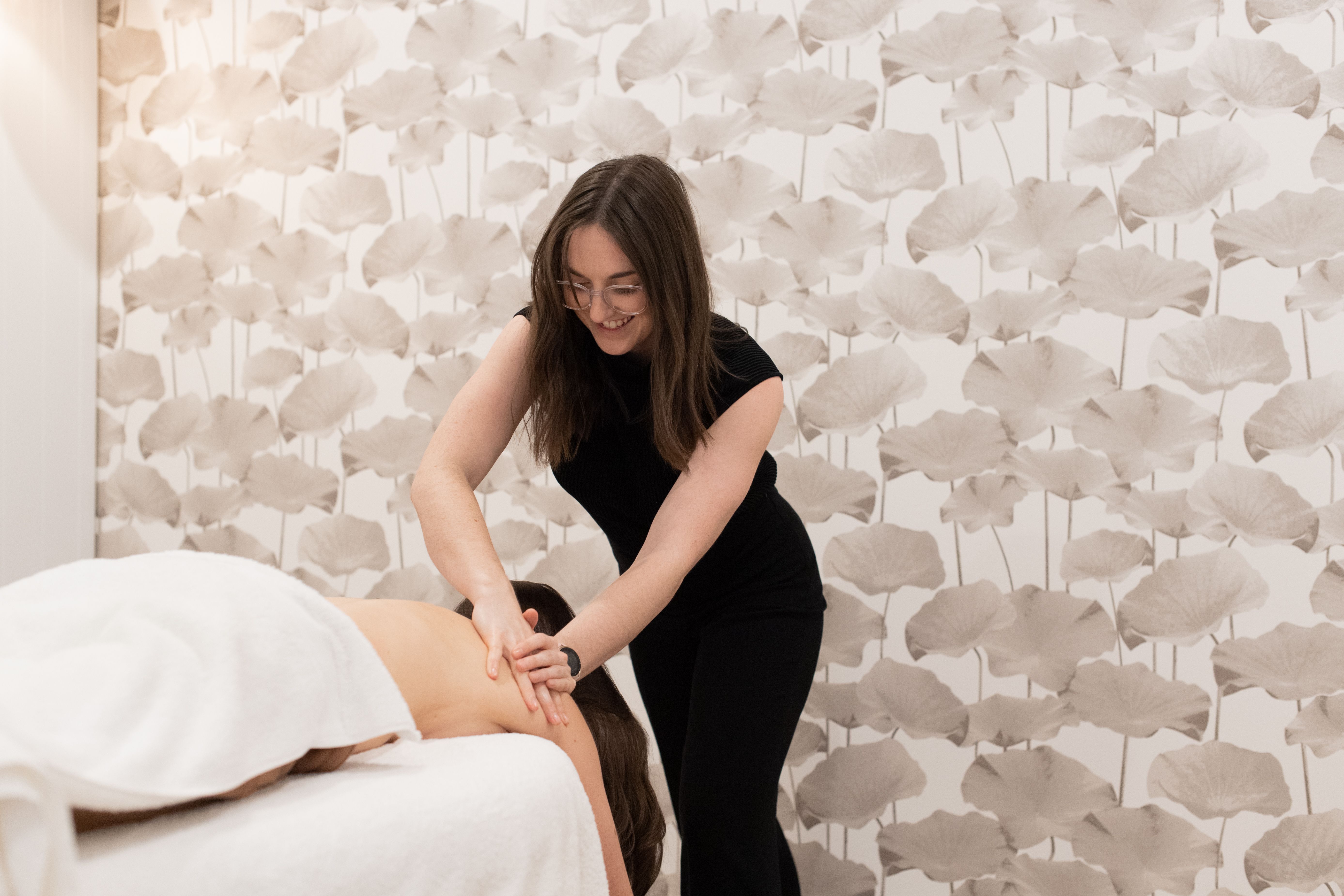 Osteopath Monique performing a treatment in her practice in Melbourne